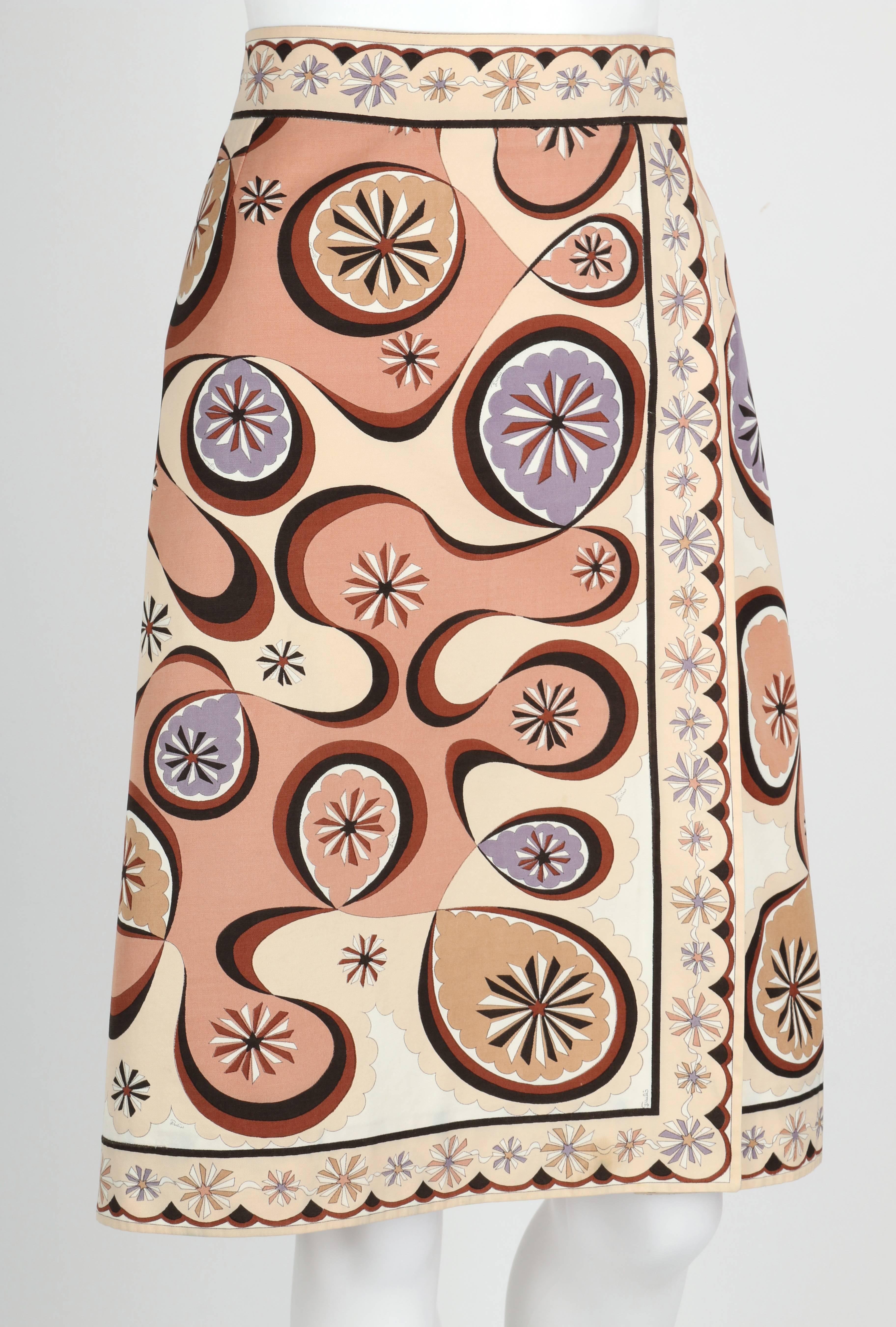 Vintage c.1970's Emilio Pucci beige and brown multicolor star burst signature print cotton wrap A-line skirt. Decorative scalloped op art border detail at waist, closure and hem. Wrap secures with snaps and hook/eye. Marked Fabric Content: 