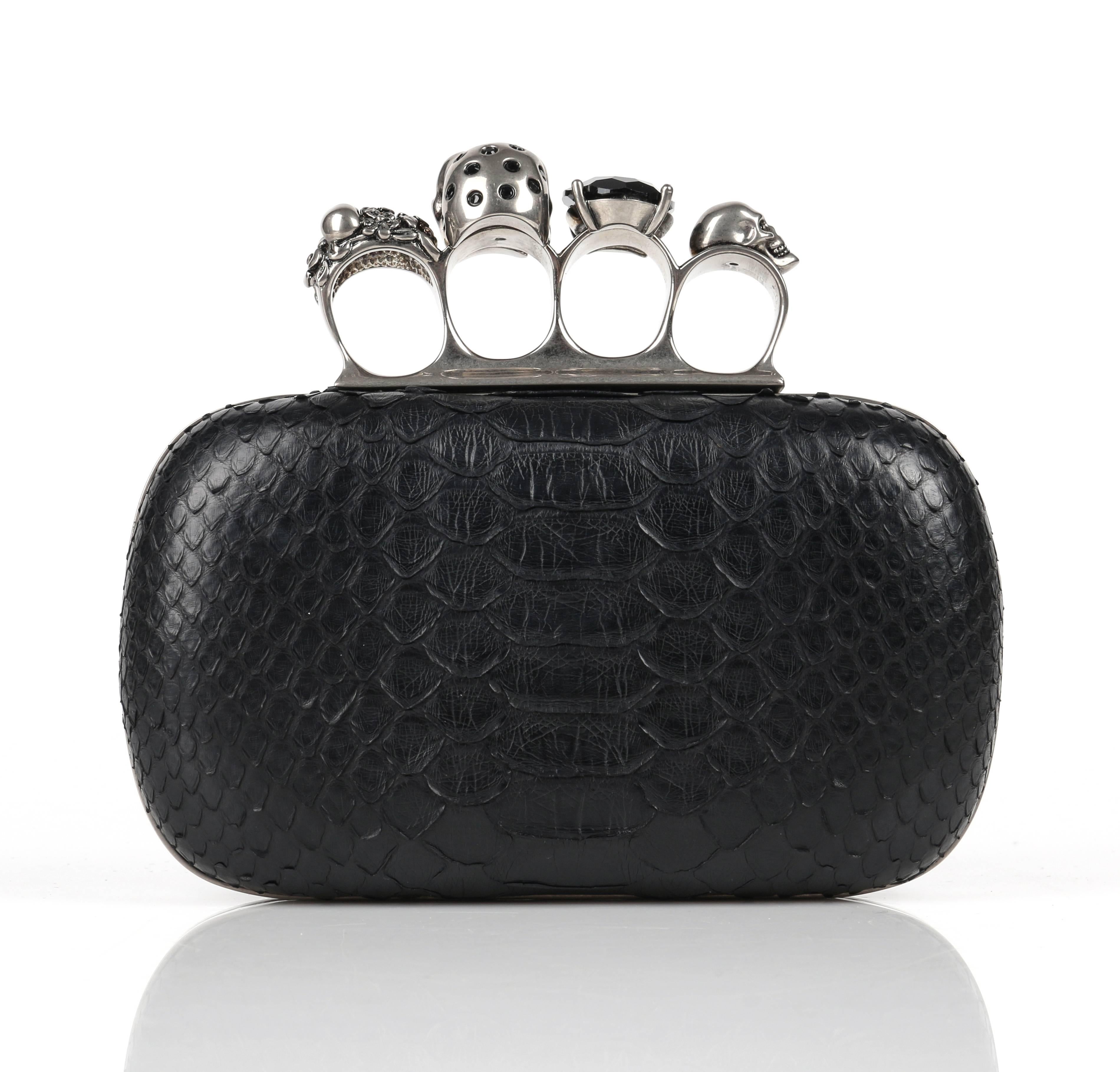 Alexander McQueen Spring/Summer 2010 black genuine python knuckle duster box clutch. Distressed silver tone hardware. Signature hinged clasp with four 