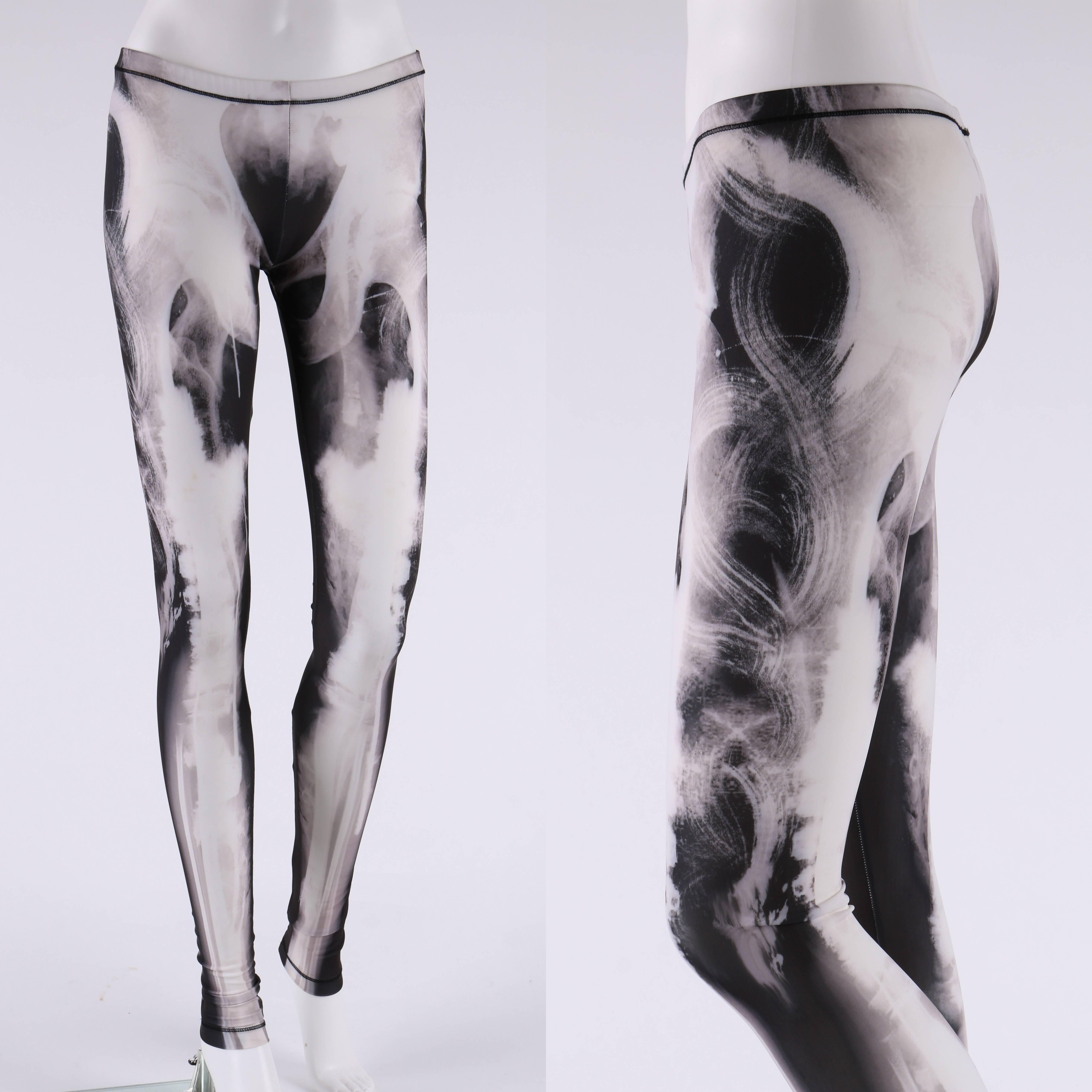 McQ by Alexander McQueen c.2012 X-ray print leggings. Elastic waist band. Black and white abstract x-ray print. Marked Fabric Content: 