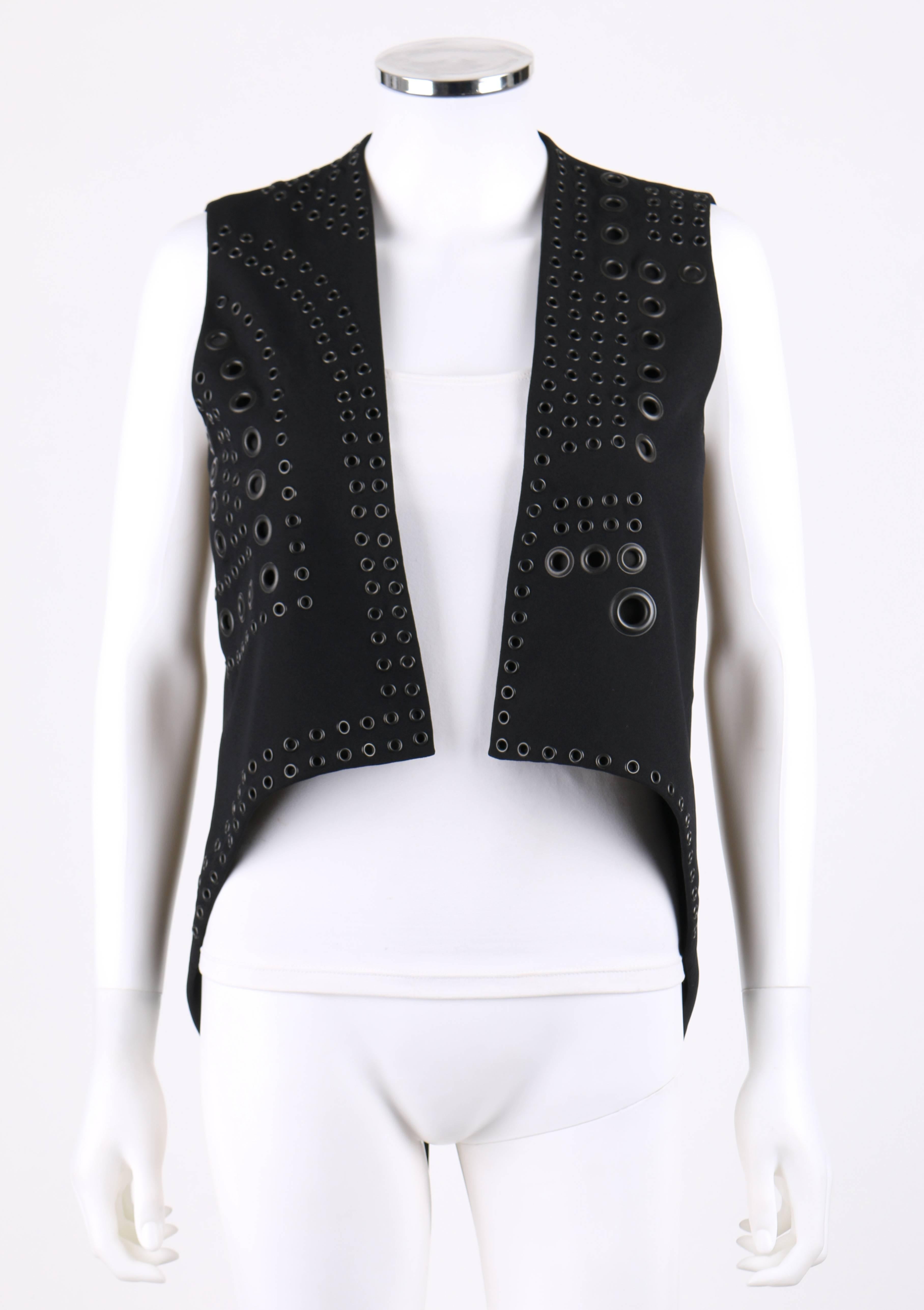 Givenchy c.2011 black vest embellished with various sized gunmetal toned grommets. Elongated coattails with 12