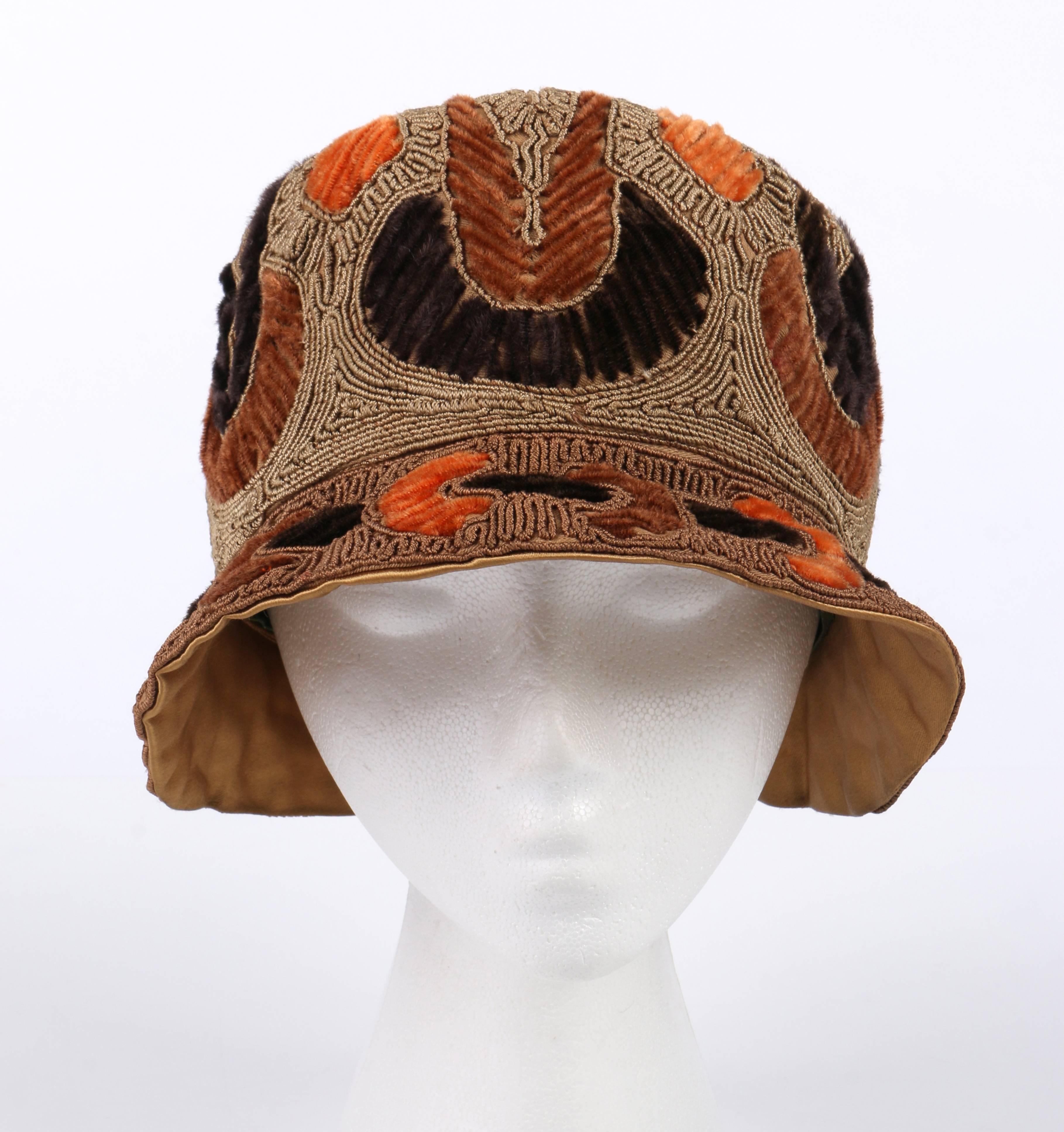 Vintage couture c.1920's Rich Art Models by Felsenthal Hat Co. gold and bronze heavily corded/embroidered flapper cloche hat. Heavily embellished with gold bullion thread on body and bronze bullion thread on brim. Brown, dark brown and orange