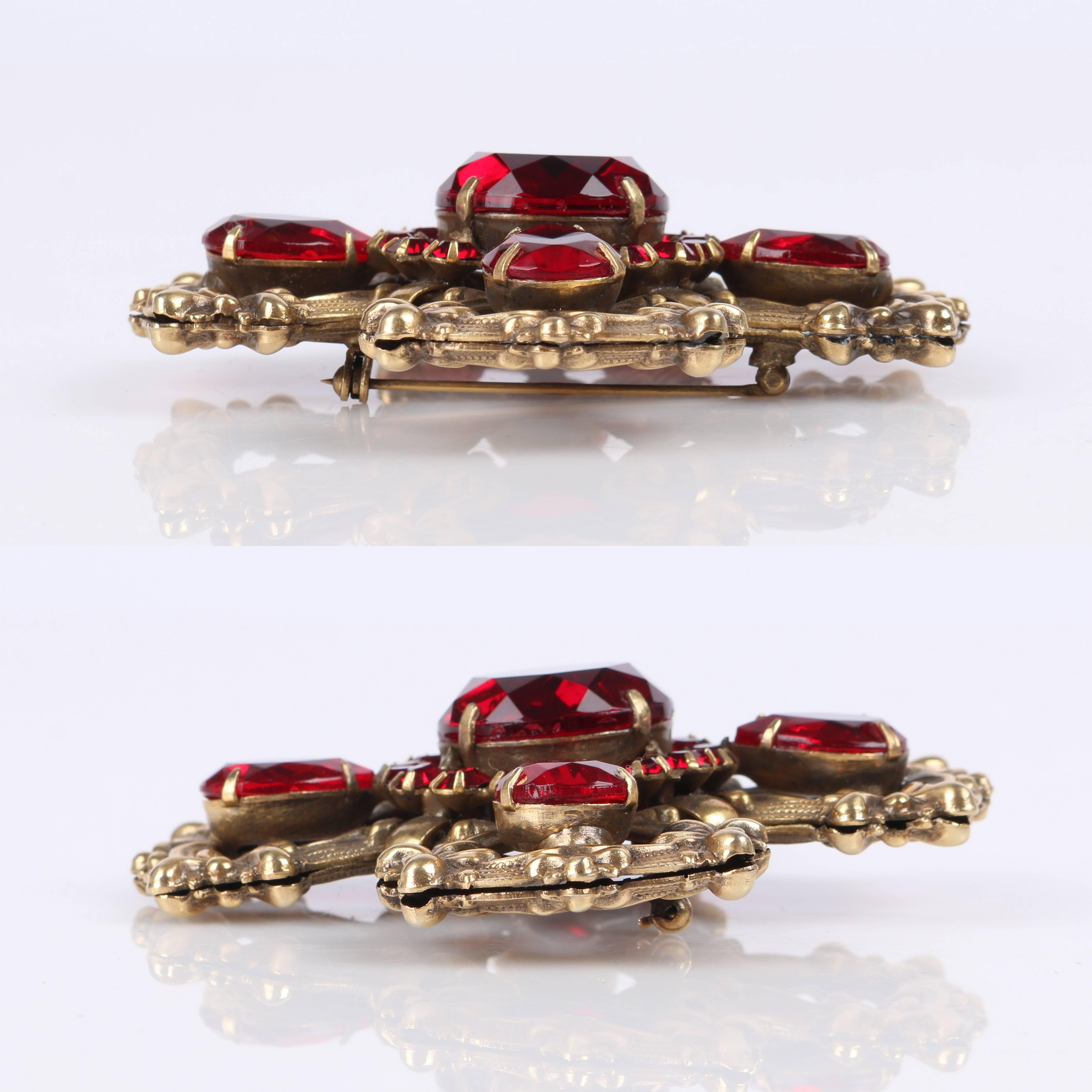red brooch pin