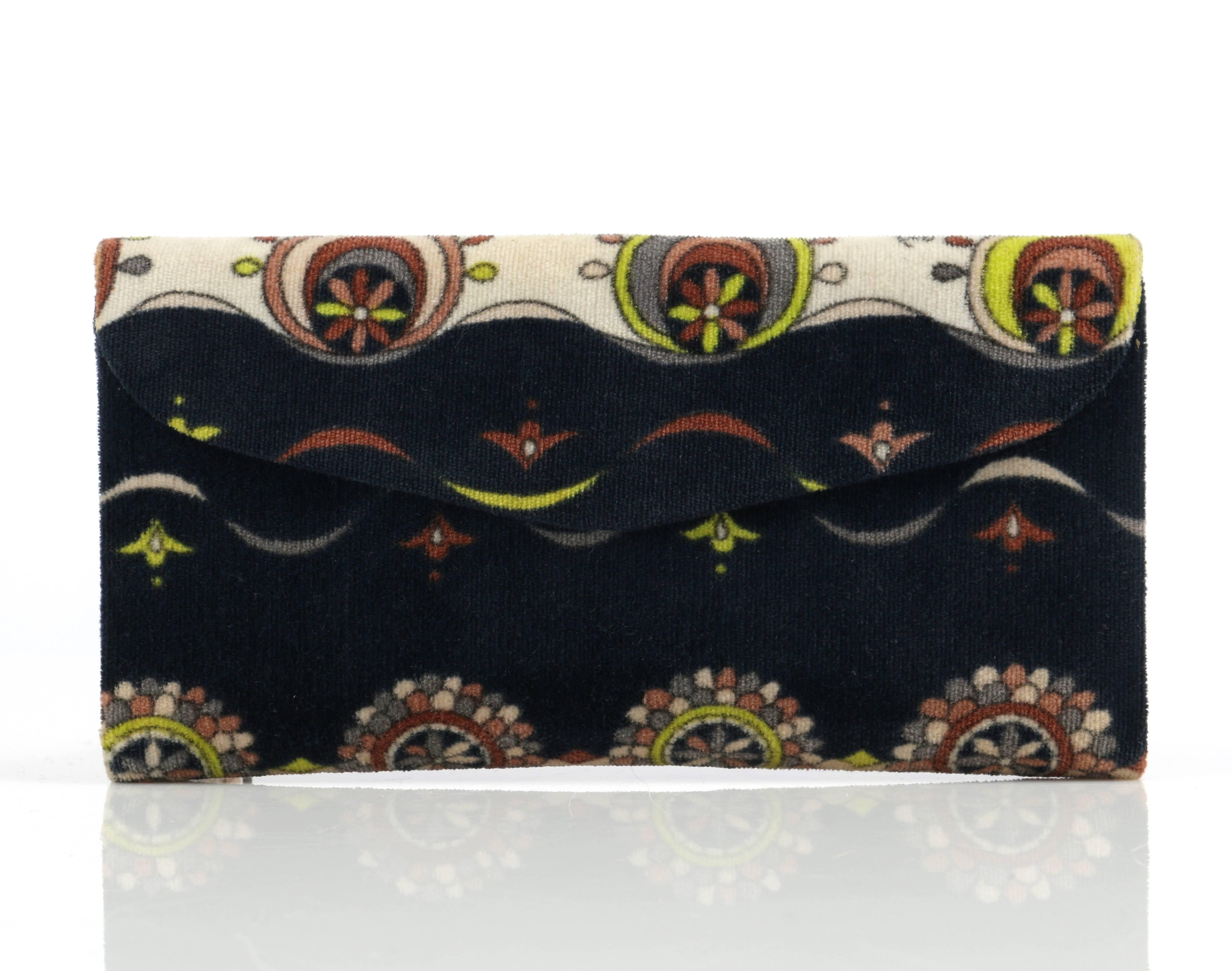Vintage c.1960's (rare style) bi-fold velvet floral print in shades of black, cream, lime, brown, and gray wallet. Gold-tone metal hinge clasp with brown leather oval detail. Light brown leather lined with gold 