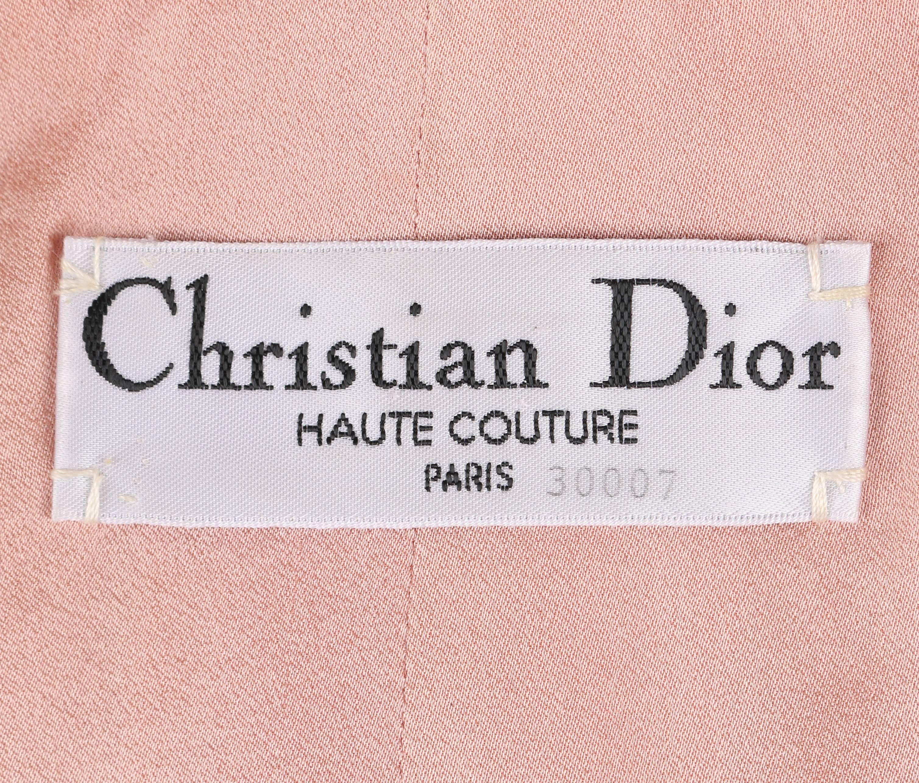 Christian Dior Haute Couture c.1990's (inspired by the S/S 1962 Dior garments) vintage two piece pink silk skirt suit. This suit was designed specifically for New York Philanthropist, Carroll Petrie. Raw silk jacket has 3/4 length sleeves with