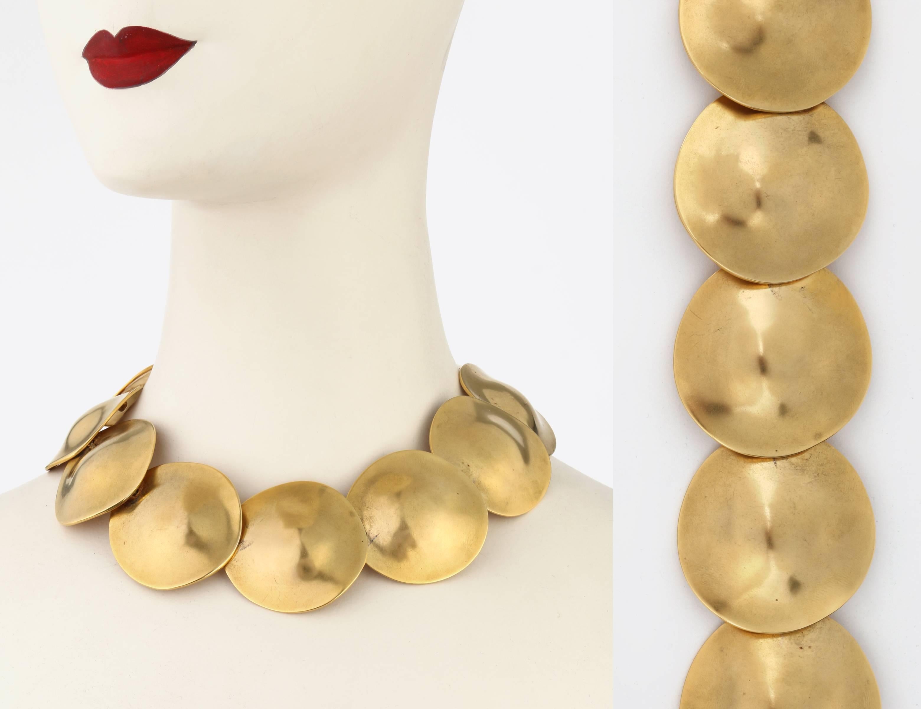 Vintage signed Robert Lee Morris c.1981 24K gold plated brass disc necklace. From a Cory award winning collection, this rare necklace was originally designed for a Calvin Klein fall 1981 runway show. Handcrafted domed sculpted discs measure