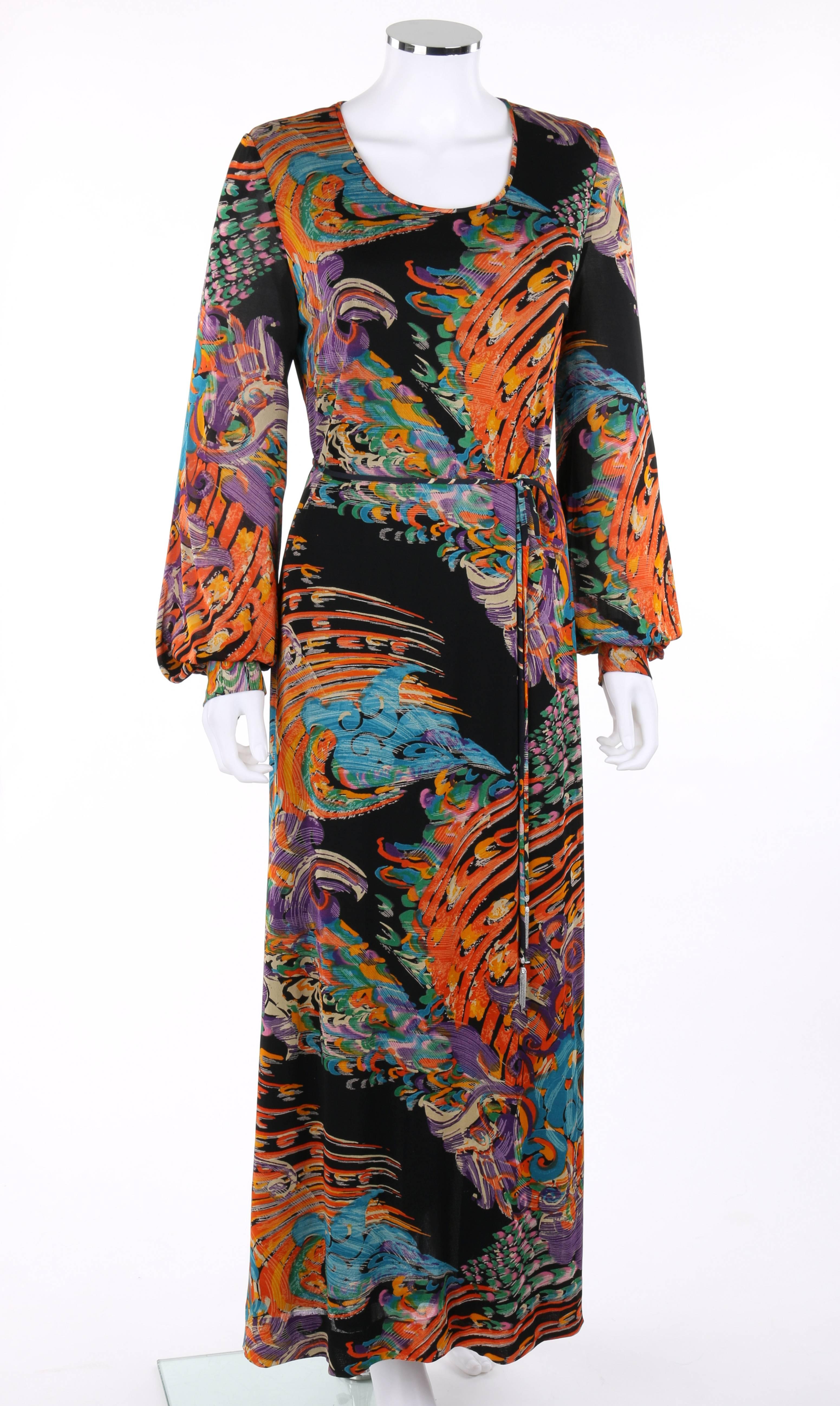 Vintage Givenchy Nouvelle Boutique c.1970's knit maxi dress. Multicolor abstract painterly print in shades of orange, gold, green, blue, purple on black sheer knit. Long bishop sleeves with single silver-toned rhinestone floral button closure at