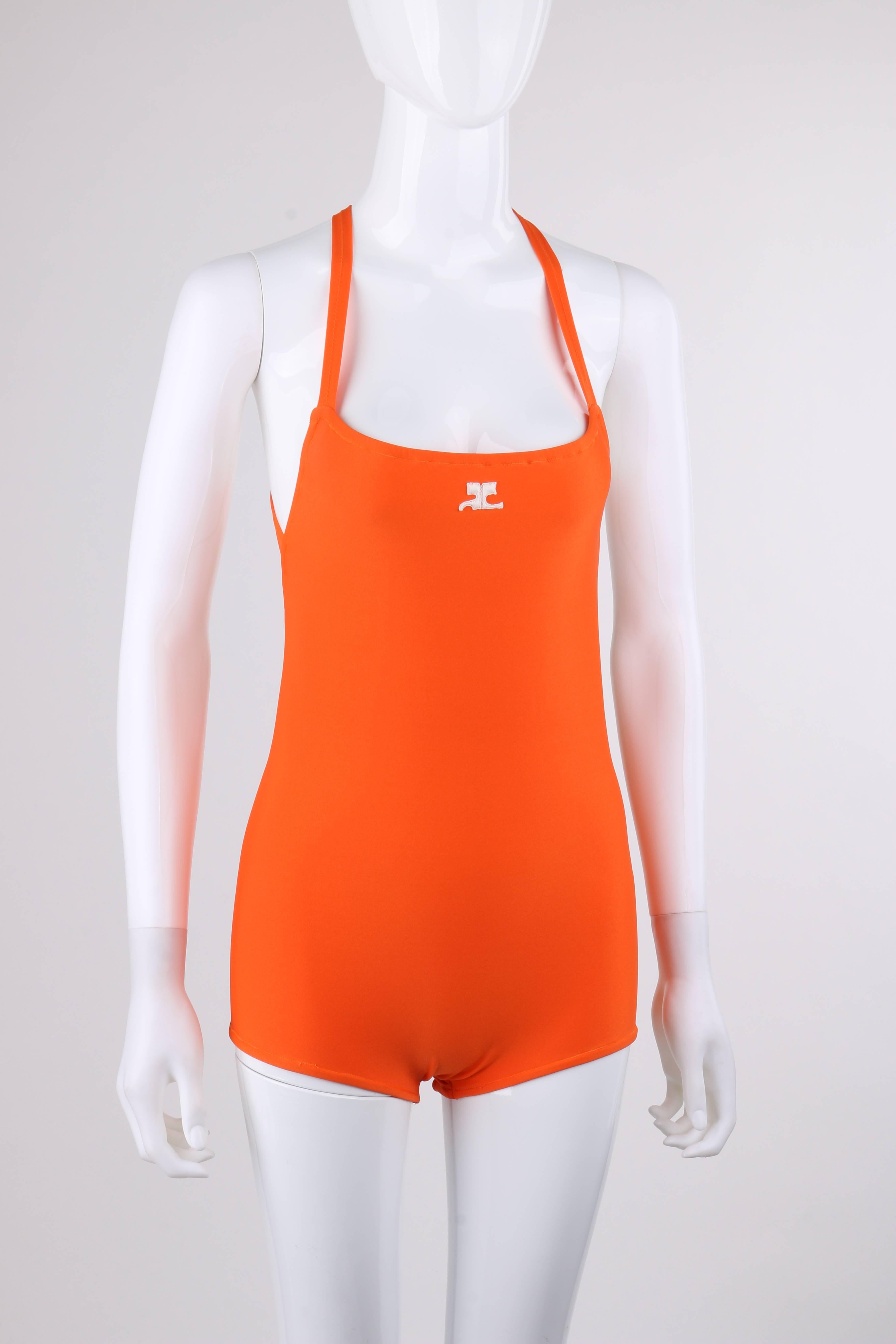 Vintage Courreges c.1960's orange criss-cross back one piece bathing suit. Designed by Andre Courreges. Square neckline. Center front white Courreges 