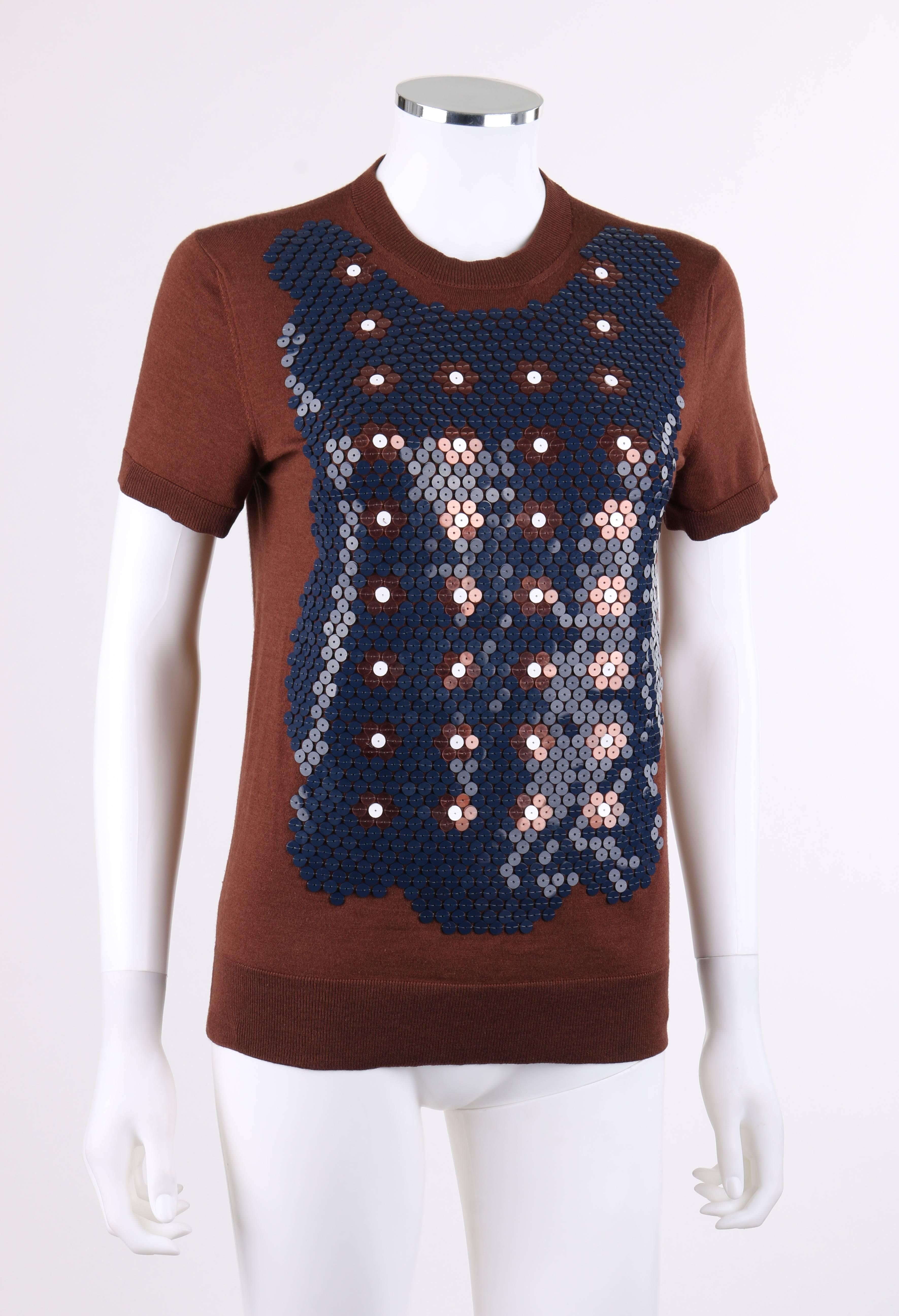 Louis Vuitton Resort 2013 brown wool / silk knit floral sequin embellished top. Designed by Marc Jacobs. Clear and white floral motif with navy blue sequin embellishment at front. Scoop neckline. Short sleeves. Pull on style. Rib knit detal and