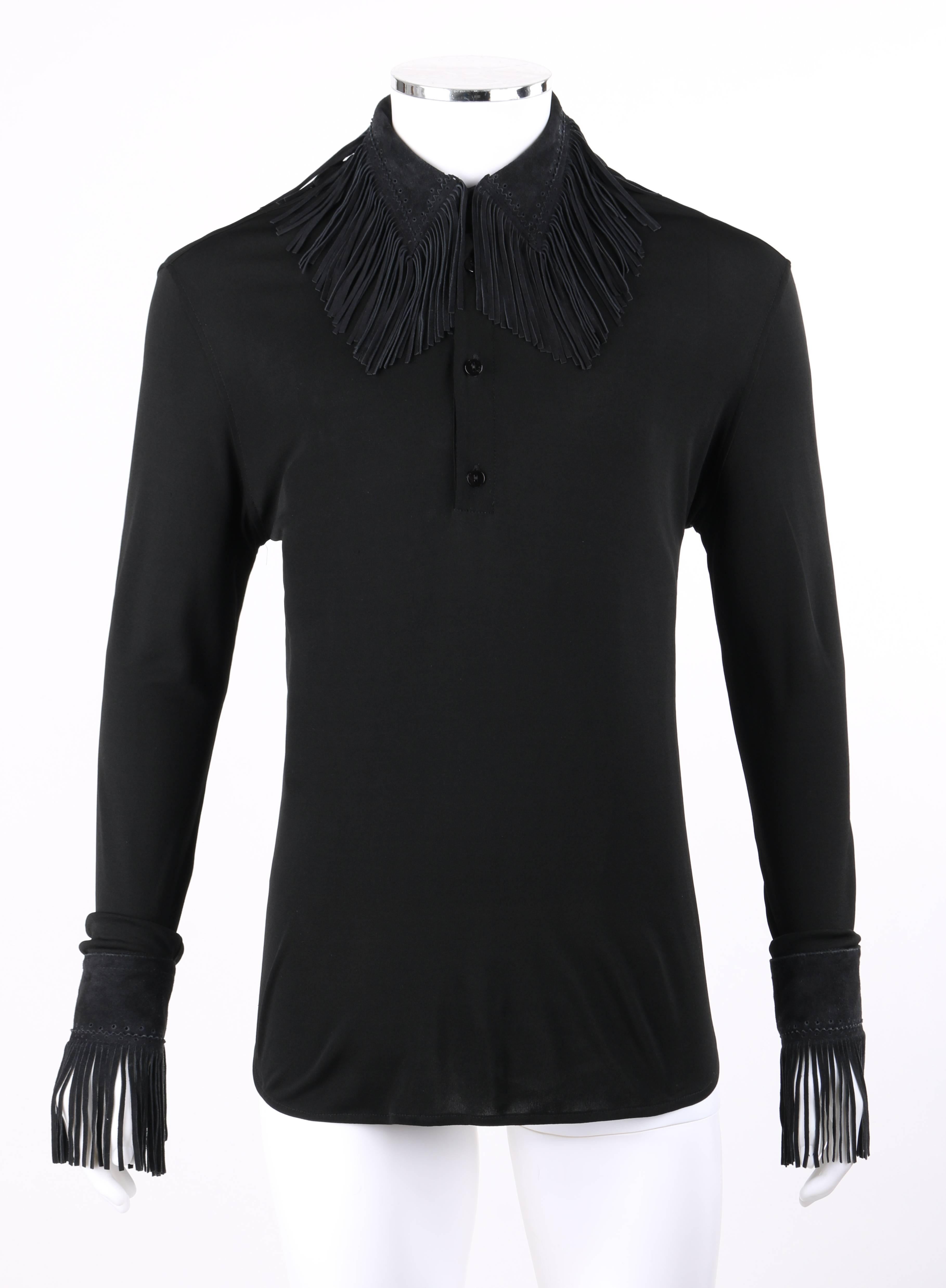 Jean Paul Gaultier Homme black rayon knit long sleeve suede fringe detail top. Black suede leather shirt collar and sleeve cuffs with brogue and long fringe detail. Extra long sleeves with single button closure at cuffs. 1/4 front placket with four