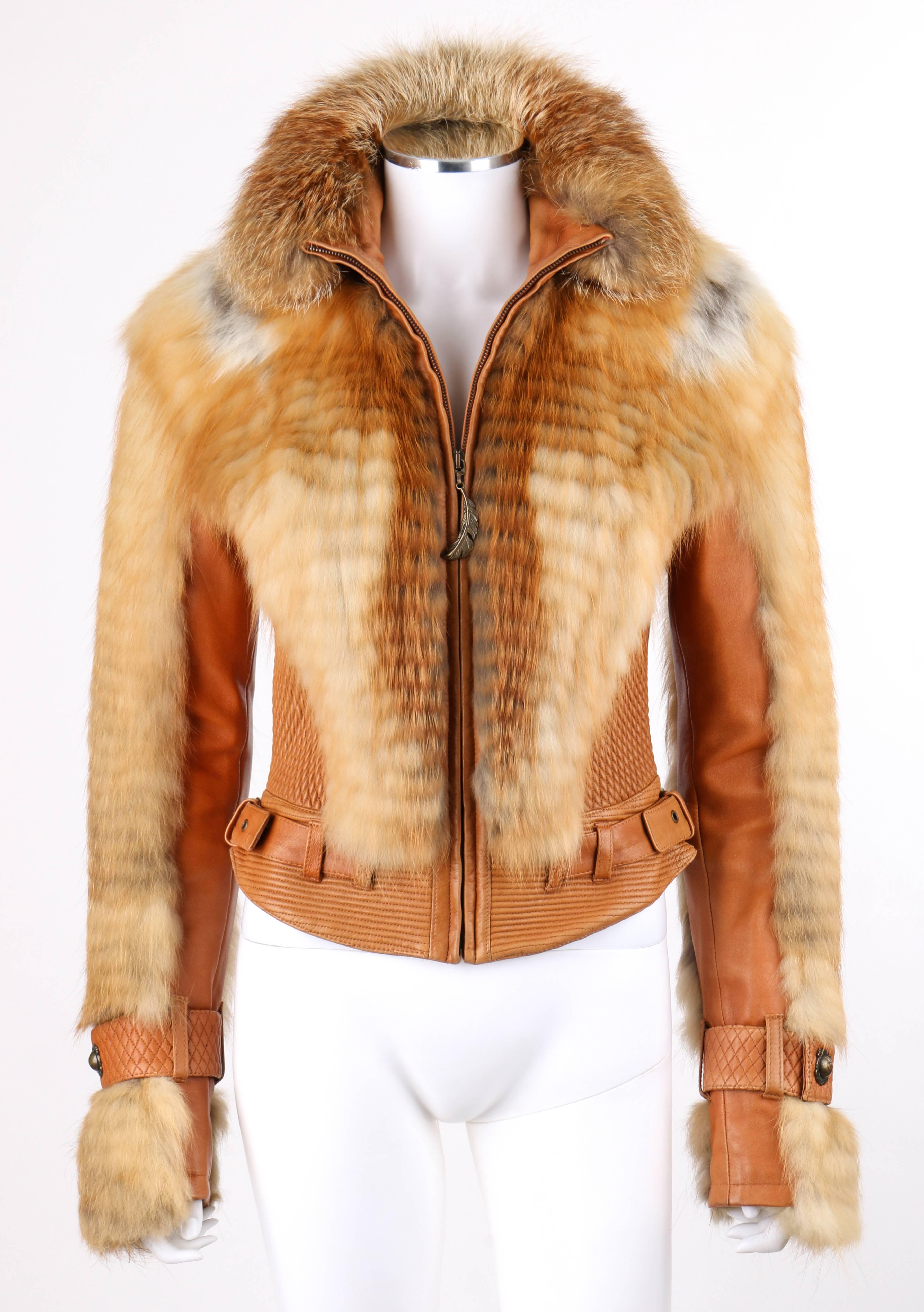 Just Cavalli by Roberto Cavalli Autumn/Winter 2007 tan leather genuine fox fur motorcycle jacket. Ribbed leather mandarin collar with fox fur trim along top. Three belt loop detail along back of collar. Center front zipper closure with brass-toned