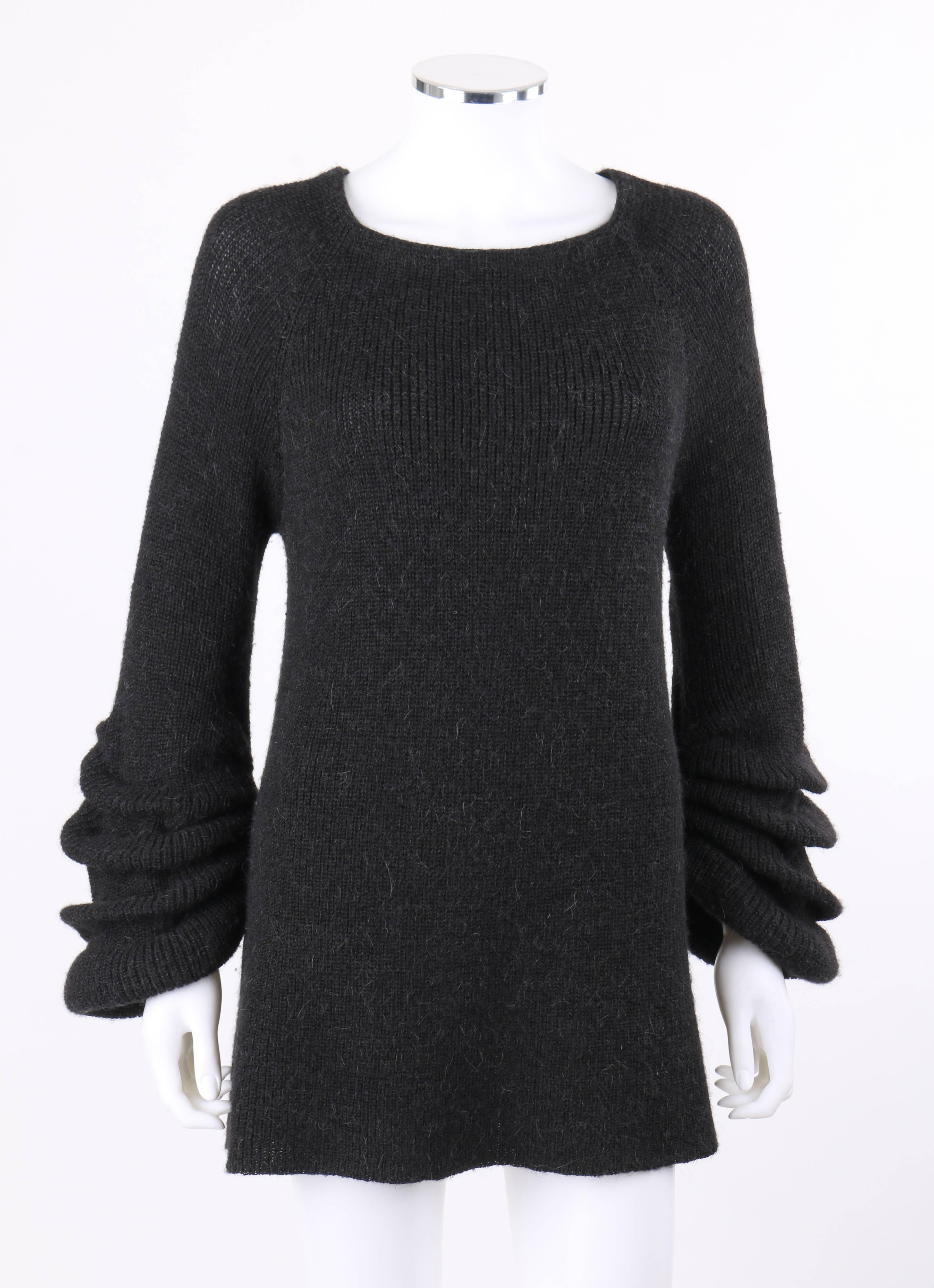 Valentino Autumn/Winter 2008 charcoal gray wool / alpaca knit gathered bell sleeve sweater designed by Alessandra Facchinetti. Large rib knit. Long raglan bell sleeves with pleated detail at cuffs. Scoop neckline. Pull over style. Marked Fabric