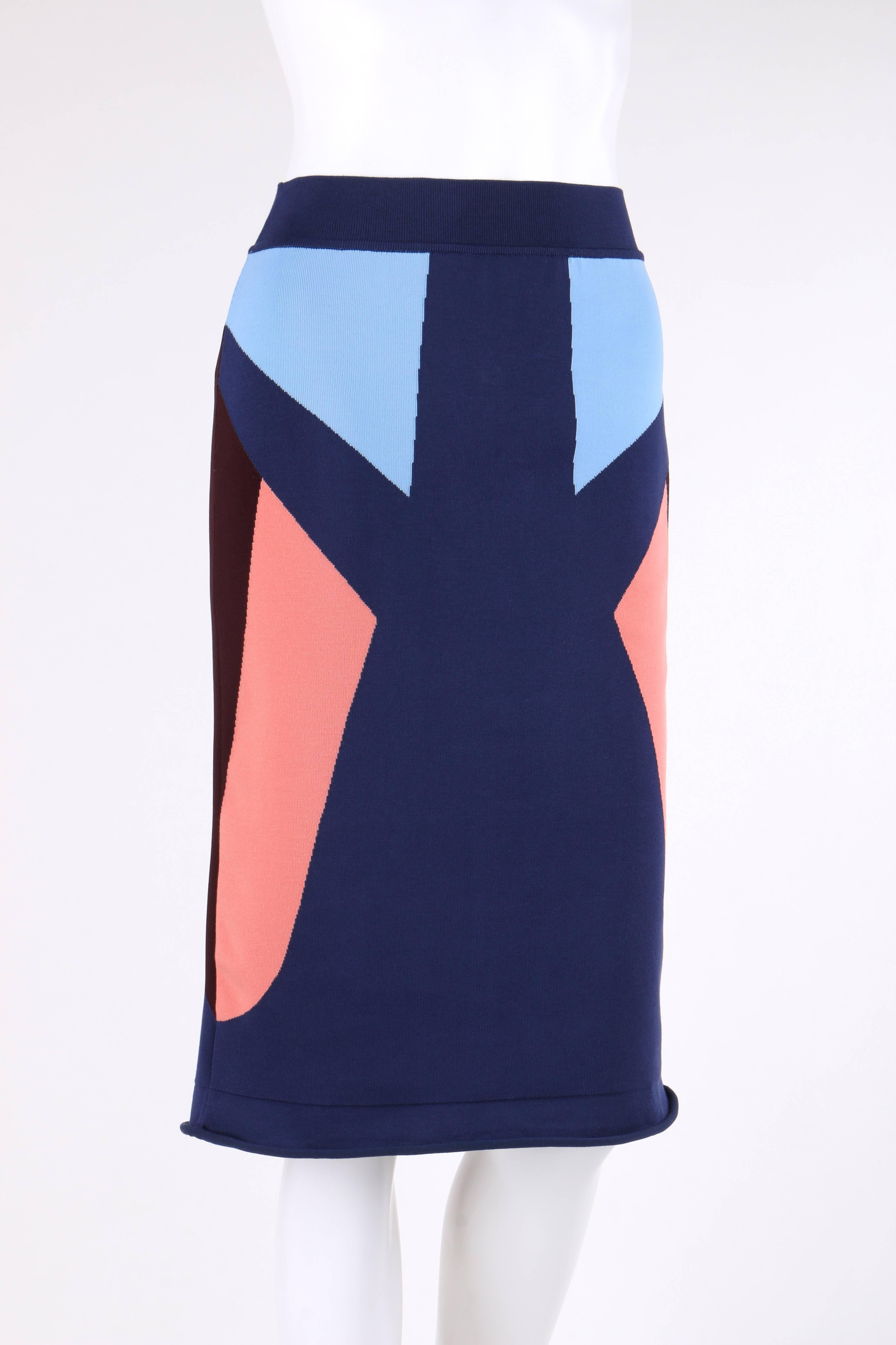 Louis Vuitton Autumn / Winter 2016 multi-color colorblocked knit pencil skirt; New with tags. Designed by Nicolas Ghesquière. Multi-color geometric colorblocked pattern knit in shades of navy blue, peach, brown, and sky blue. Banded waistline. 