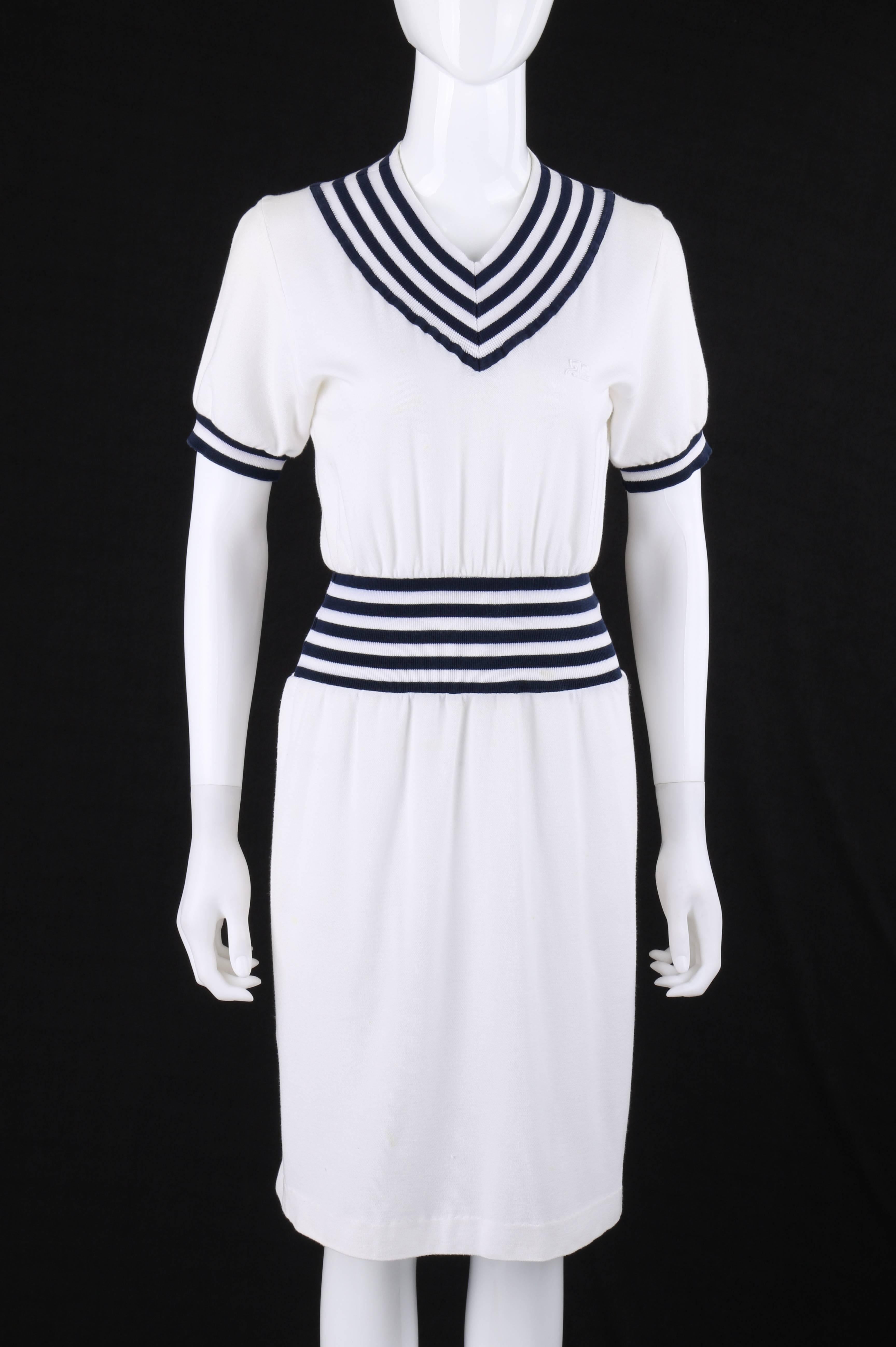 Vintage Courreges c.1980's white and navy cotton knit v-neck shift day dress. Designed by Andre Courreges. V-neckline. Short sleeves. White 