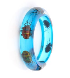 Vintage Blue Translucent Lucite Iridescent Beetle Embedded Bangle Bracelet