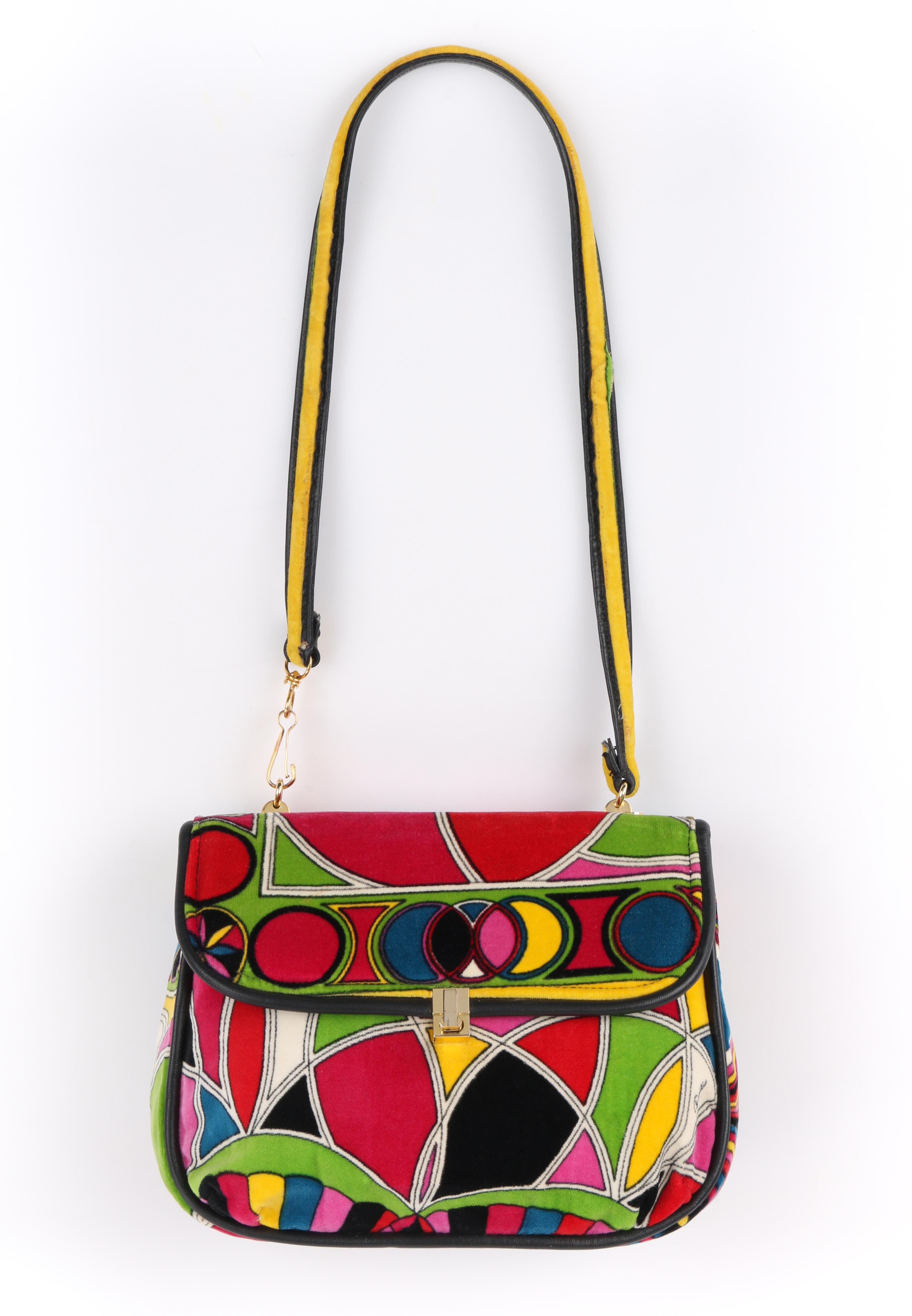 DESCRIPTION:  EMILIO PUCCI By Jana c.1960's Stained Glass Signature Print Velvet Flap Top Purse
 
Circa: c.1960’s
Label(s): Emilio Pucci Bags By Jana
Designer: Emilio Pucci
Style: Flap top purse
Color(s): Multi
Lined: Yes
Marked Fabric Content: