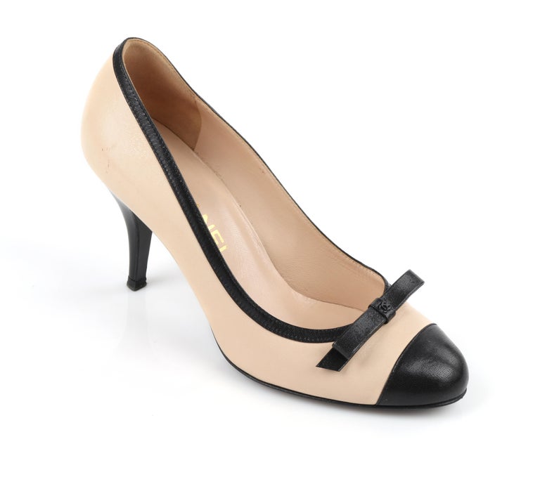 CHANEL Nude and Black Leather Classic Bow Cap Toe Sculptural Heel Pumps For  Sale at 1stDibs