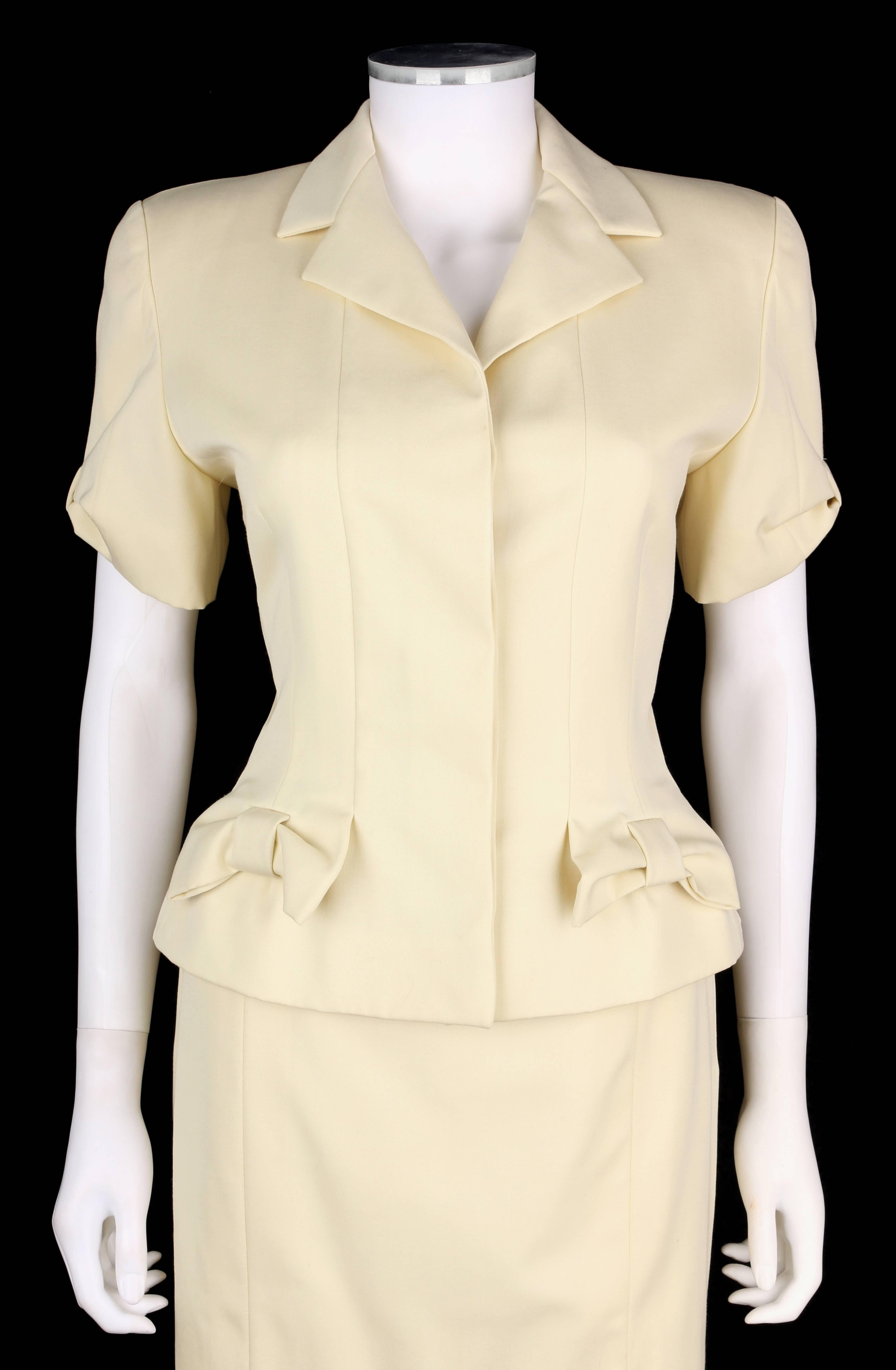 Vintage Givenchy (designed by John Galliano for the S/S/1996 Collection) 2 piece cream / light yellow blazer skirt set.  Blazer has notched lapel collar. Bow-like gathered details at front and cuffs. Matching covered four button closure front