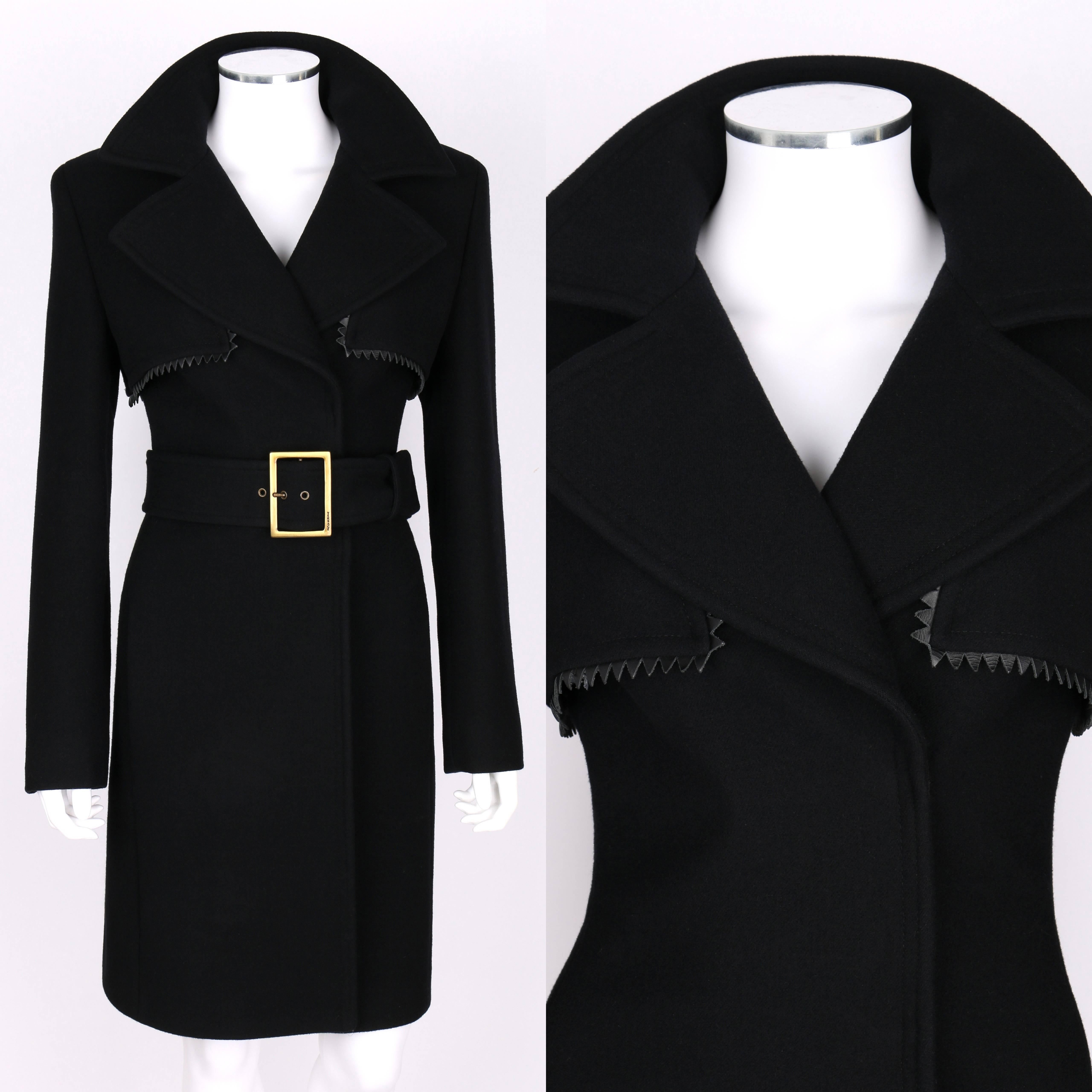 Gianni Versace Couture c. 1990's black 100% wool coat. Large notched collar/lapel. Zig-Zag genuine leather trim. Back vent. Two pockets. Closes at front with concealed snaps. Fully lined with black 