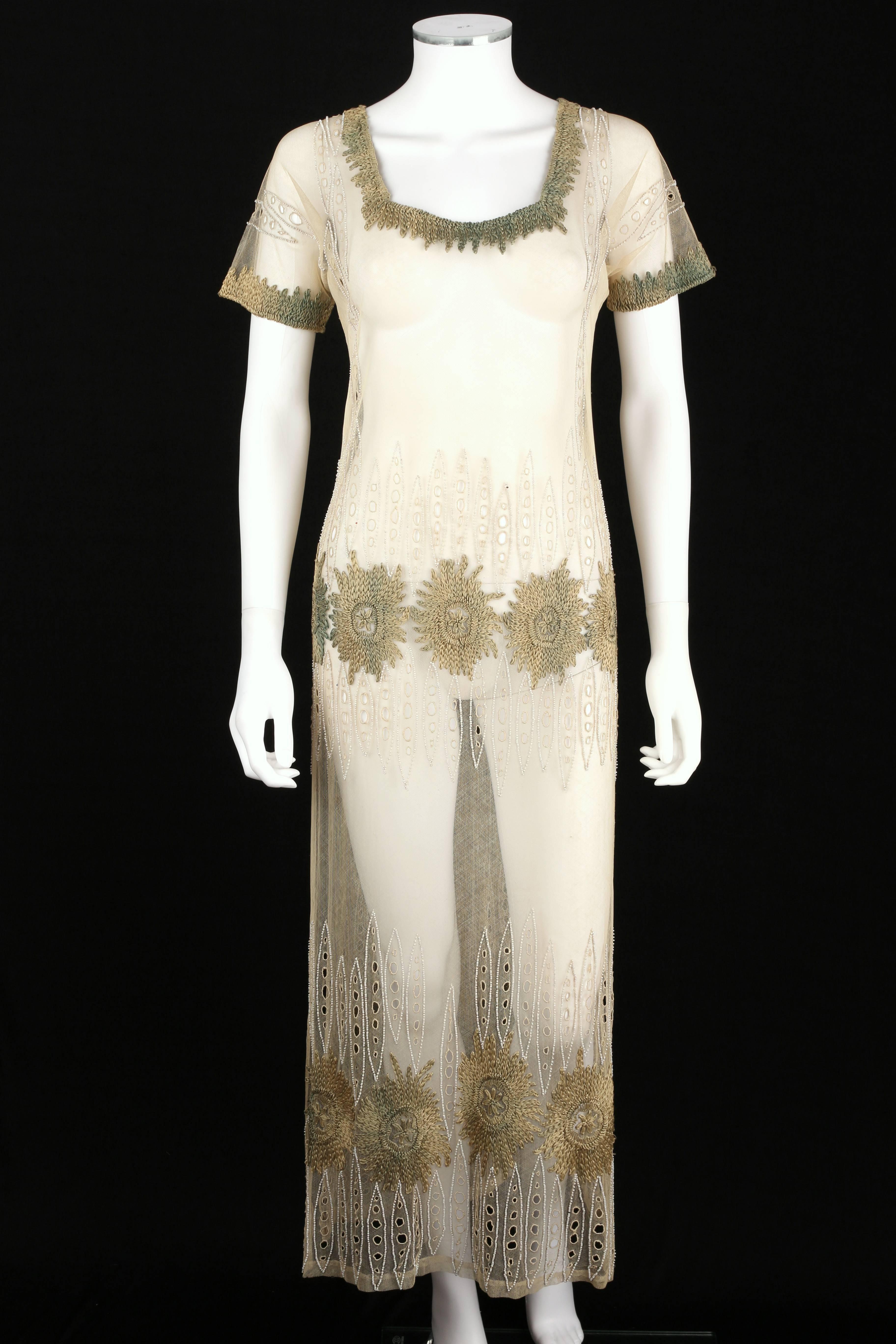 Vintage c.late 1910's ivory mesh / net tabard overdress. Embellished with hand-done beading, embroidery, and openwork. Squared scoop neckline at front and back. Short sleeves. Skirt is open at the sides. Slip-on style. Unmarked Fabric Content: