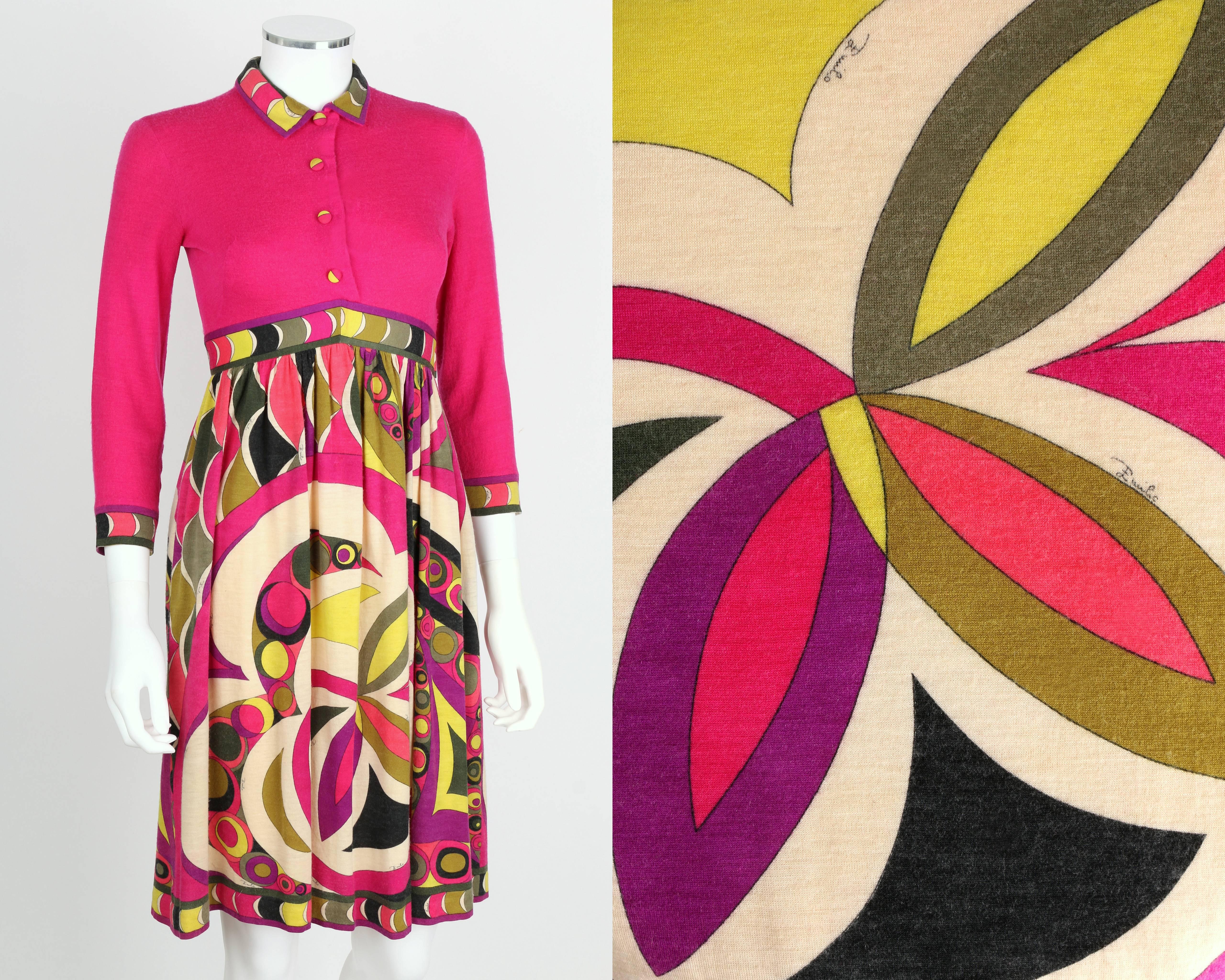 Vintage c.1960's Emilio Pucci for Saks Fifth Avenue cashmere empire waist dress. Magenta bodice with multi-color signature print skirt and decorative border trim. 3/4 length sleeves. Closes at front with concealed snaps. Zips at side. Above the knee