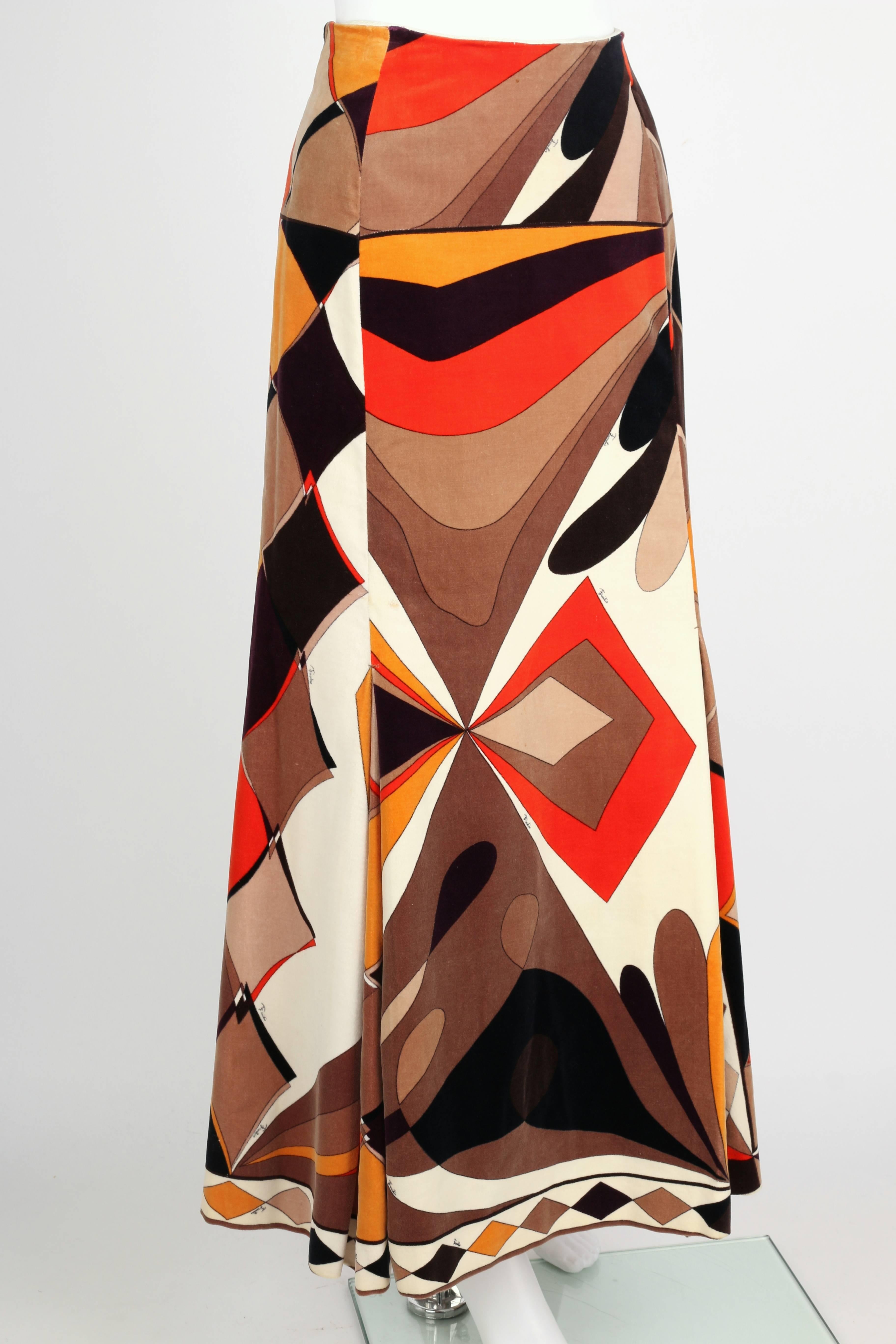 Vintage c.1960's one of a kind handmade Vogue Paris original pattern, multi-panel, maxi skirt made of Emilio Pucci signature print velvet in shades of brown, orange, and ivory. Fit and flare style. Diamond decorative border at hem. Box pleat detail