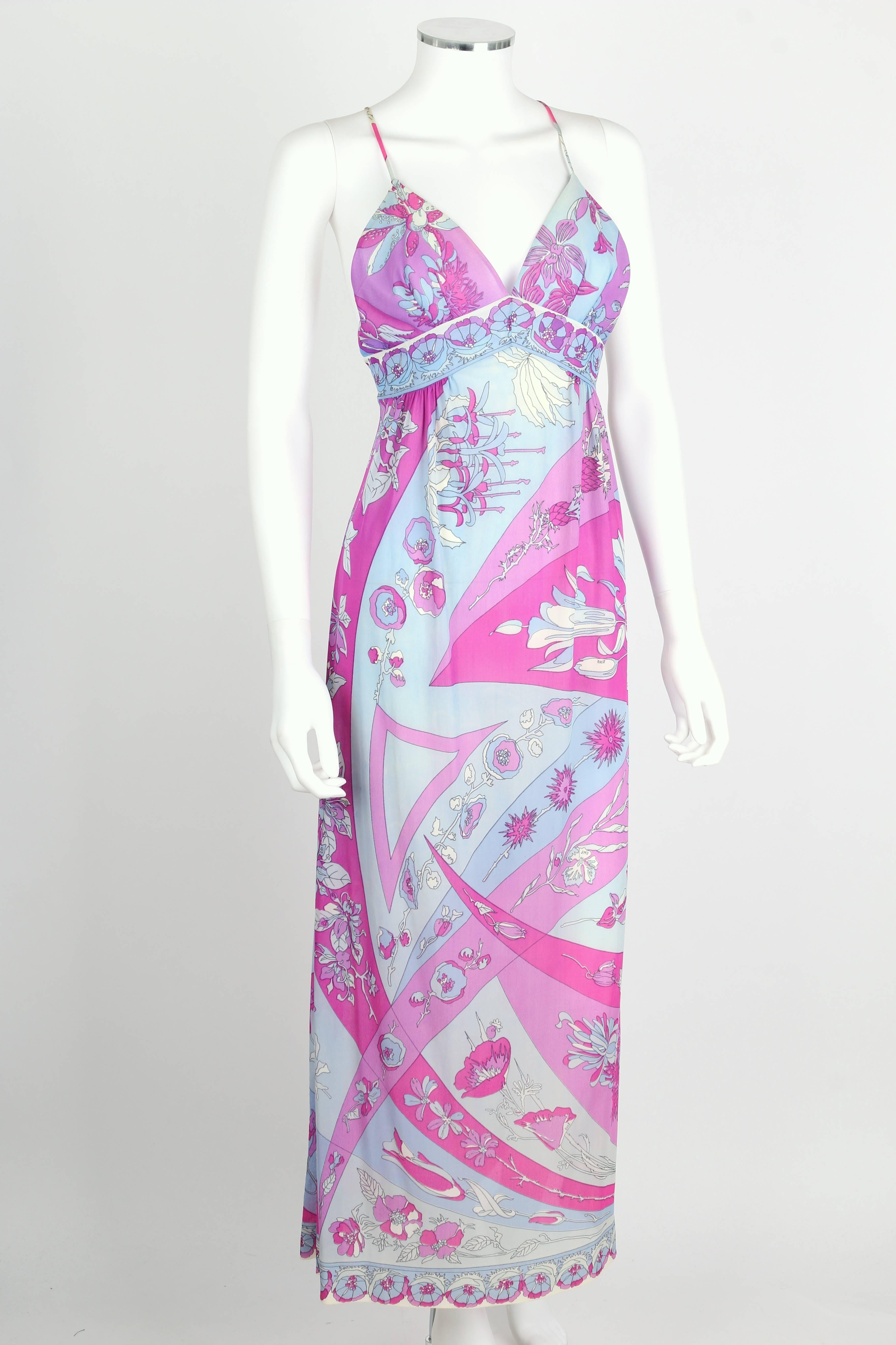 Vintage c.1970's Emilio Pucci for Formfit Rogers floral print long slip maxi dress in shades of pale blue, purple and magenta. Spaghetti straps. Low scoop back with cross strap detailing. Empire waistline. Deep v-neckline. Decorative floral border