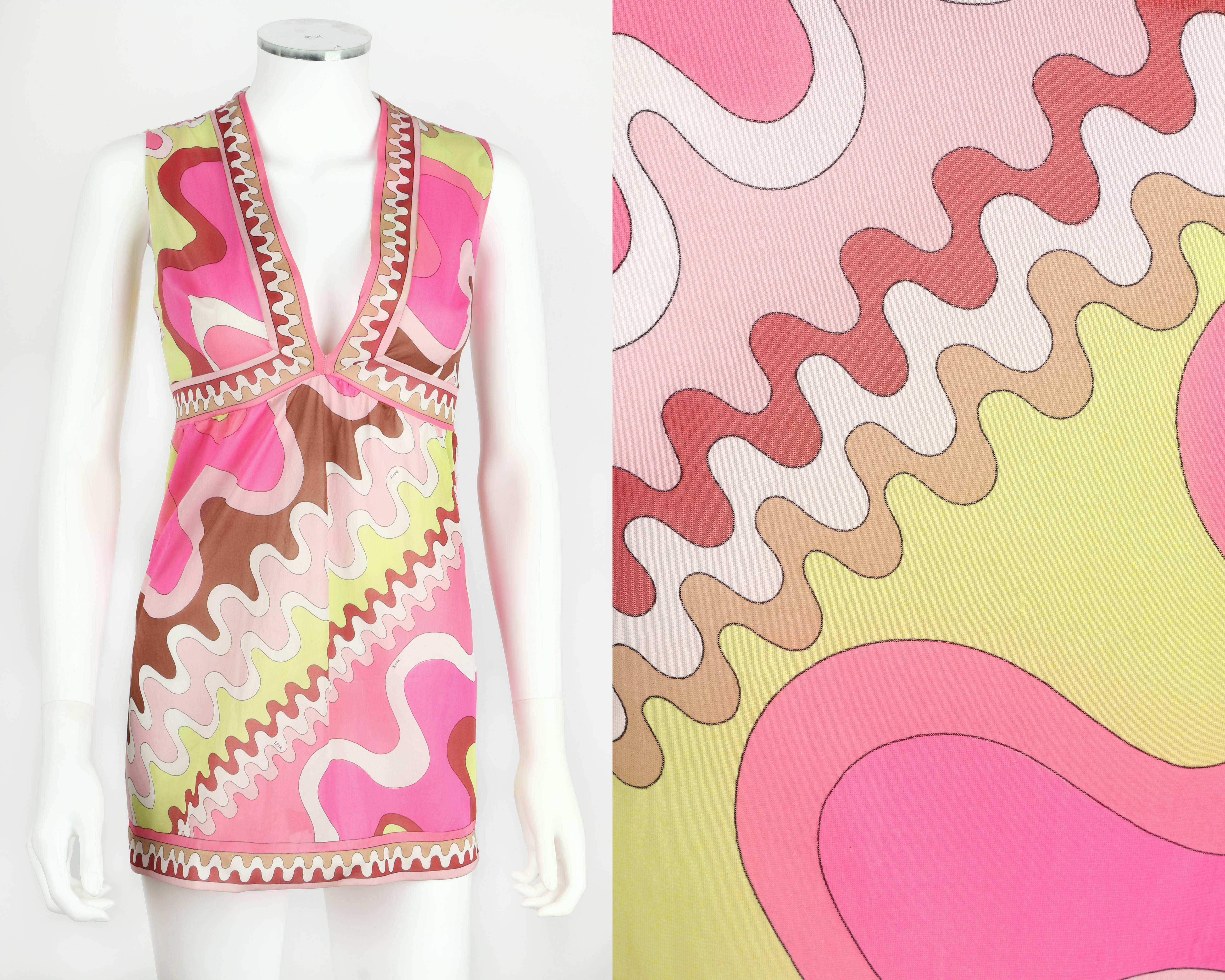 Vintage c.1960's Emilio Pucci for Formfit Rogers multicolor wave print sleeveless top. Low cut v-neckline. Empire waistline. Decorative border detail on neckline, waist, and hem. Slip on style. Has been re-hemmed. Please note that this item was