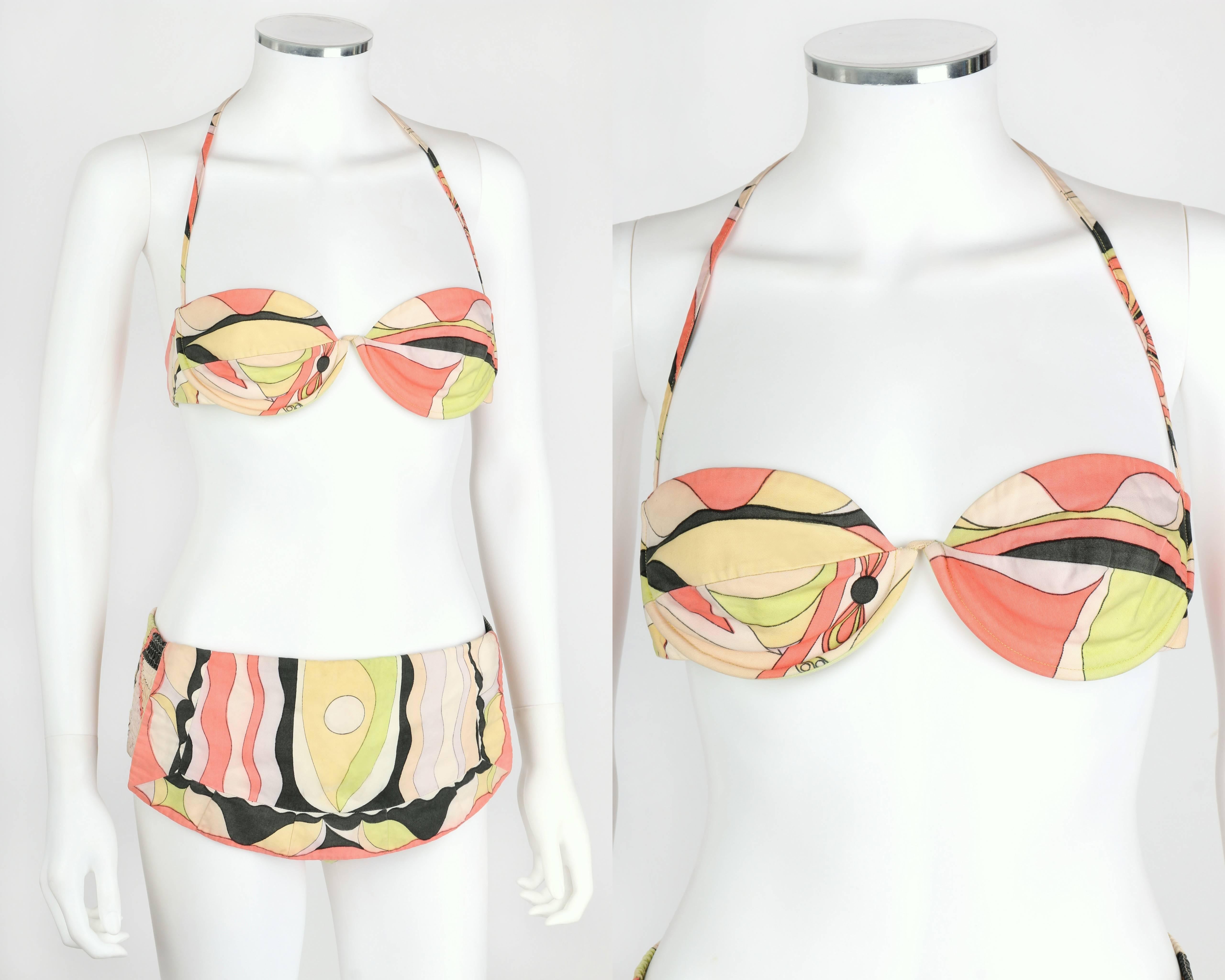 Vintage c.1960's Emilio Pucci two piece multicolor print cotton bikini. Halter top tie and underwire cups. Elastic back button closure. Top has been altered, adding buttons closure at back and shortened straps. Elastic waist band bottoms, leg holes