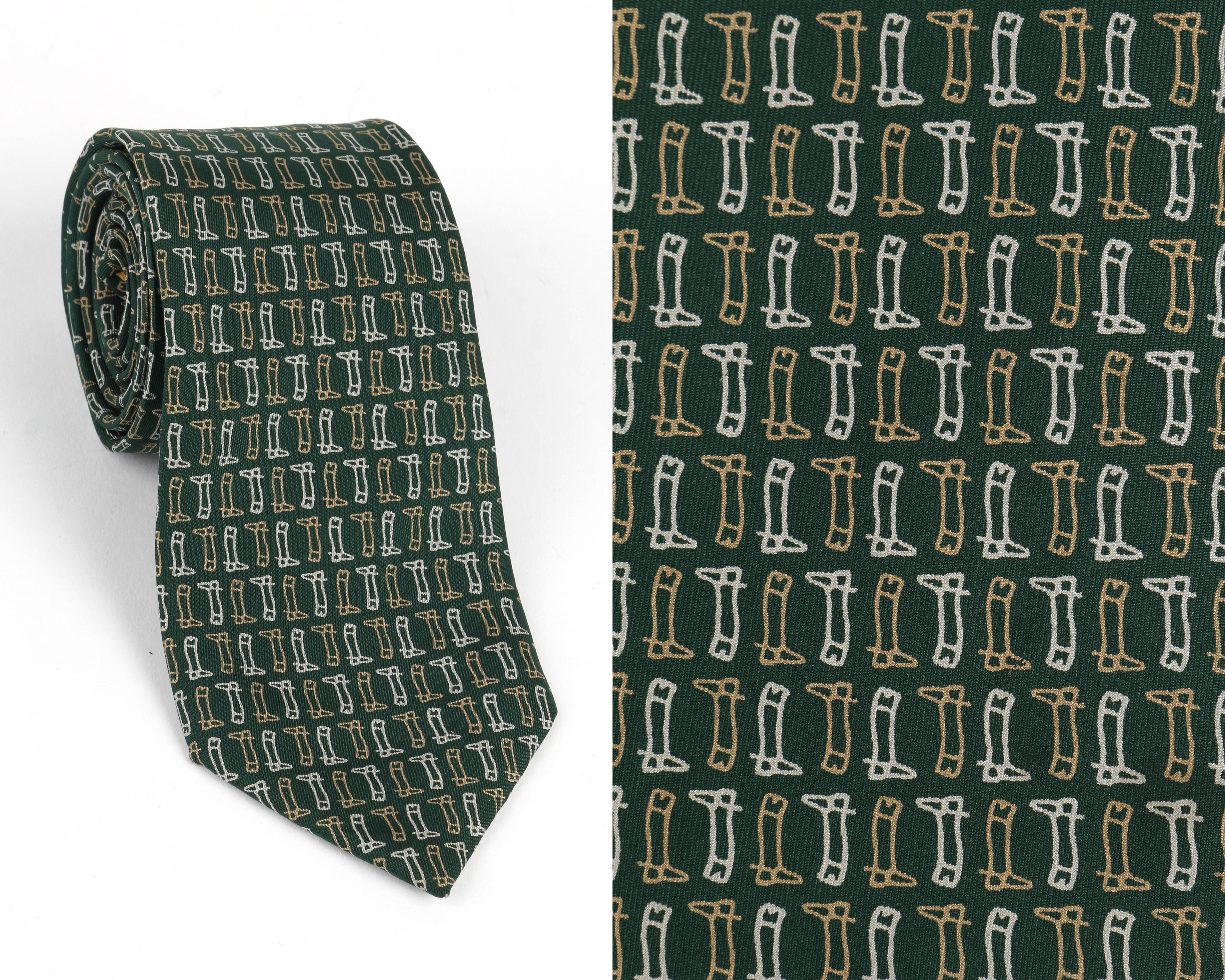 Vintage Gucci c.1970's green neck tie with gold and silver Equestrian boot print. Lined with gold Gucci signature print silk. Marked fabric content: 