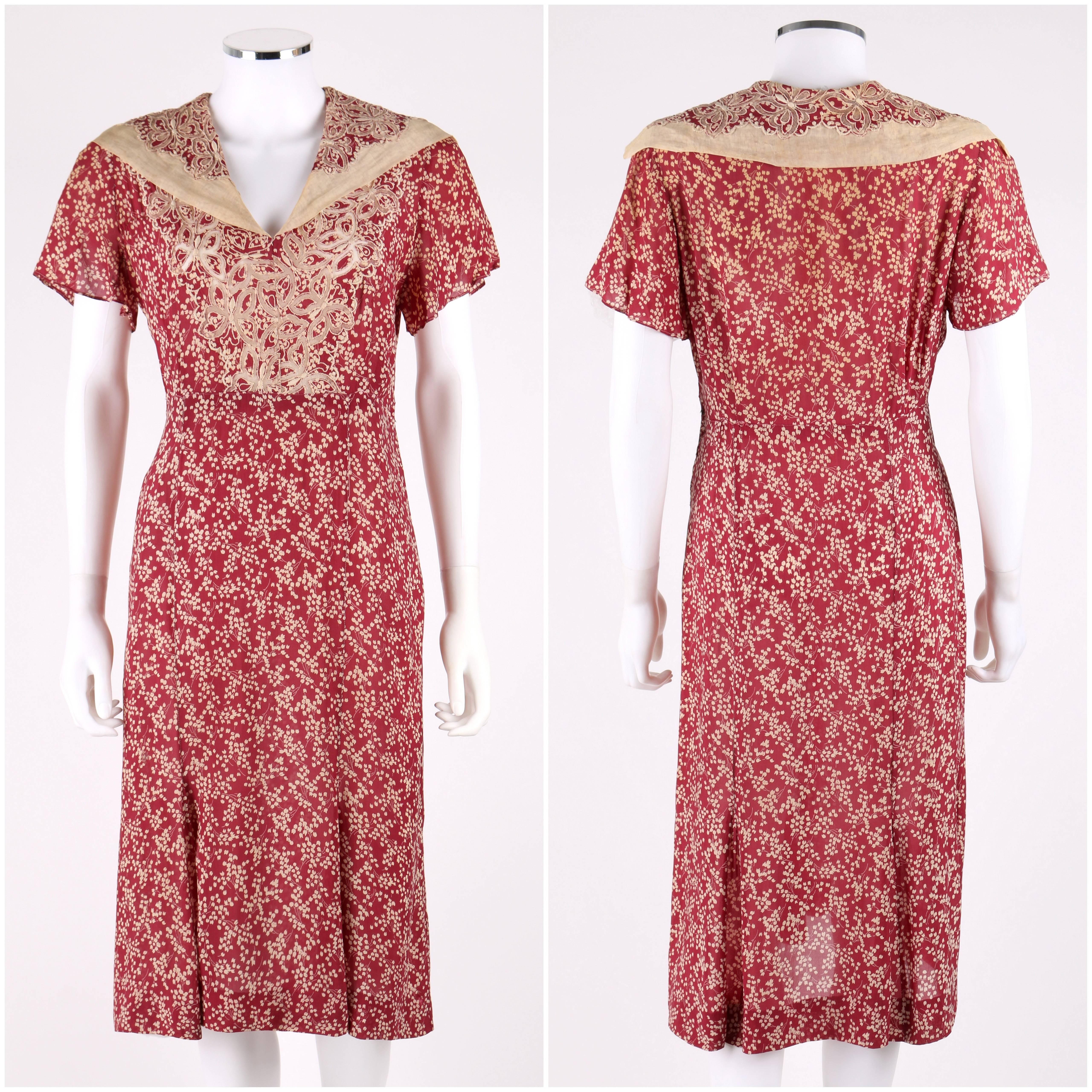 Vintage c.1930's Madeleine Vionnet for Adaptation Vionnet burgundy and cream floral (lily of the valley) print and butterfly embellished silk dress and belted jacket set. Numbered. Slender bias cut body with flare at hem day dress. Butterfly