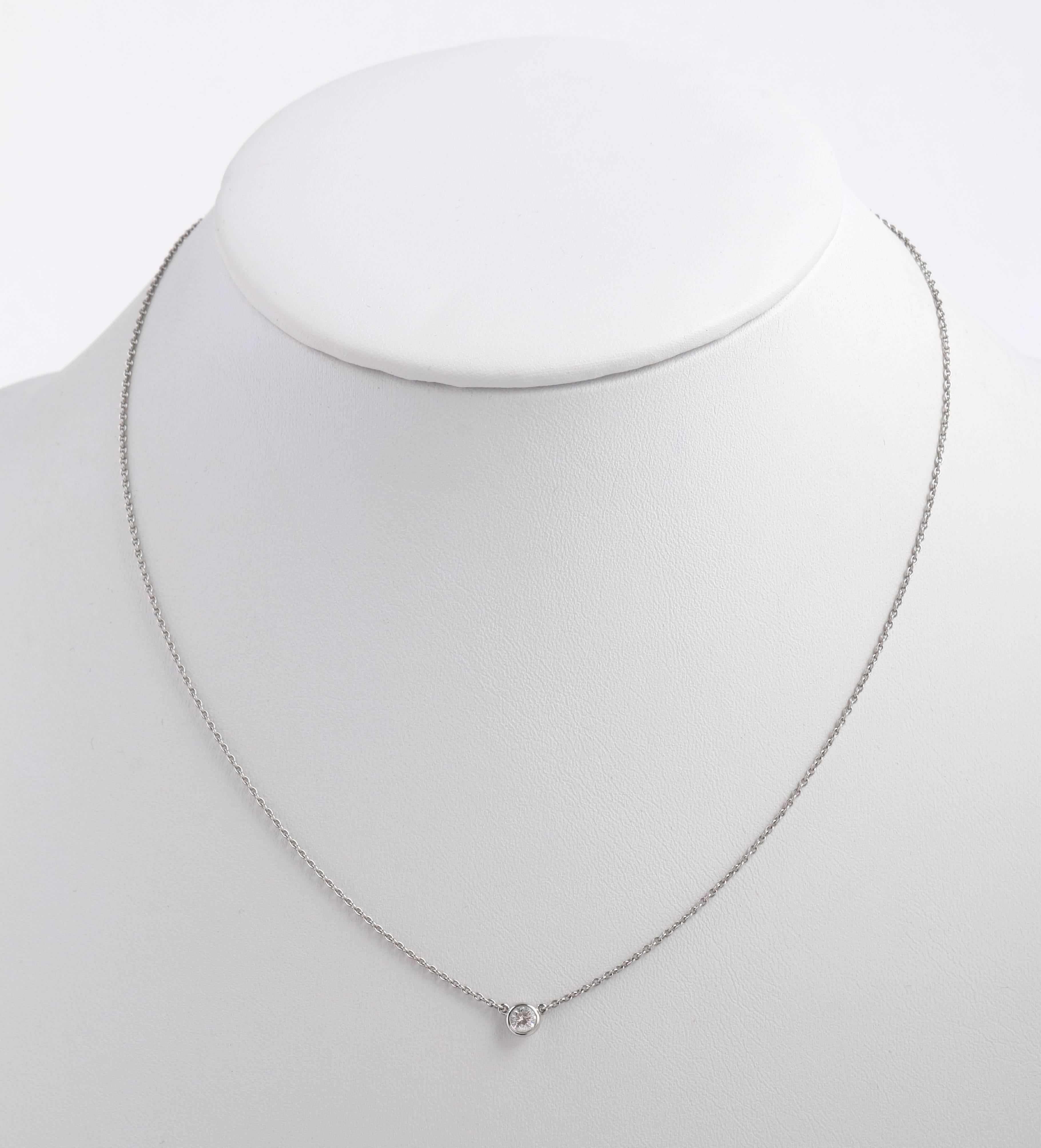Tiffany & Co Elsa Peretti “Diamonds by the Yard” platinum necklace and earring set. Platinum cable chain (approximately measuring 16.5” L, including clasp) with round bezel set diamond (approximately measuring 2.5mm). Carat weight 0.05ct . Stamped
