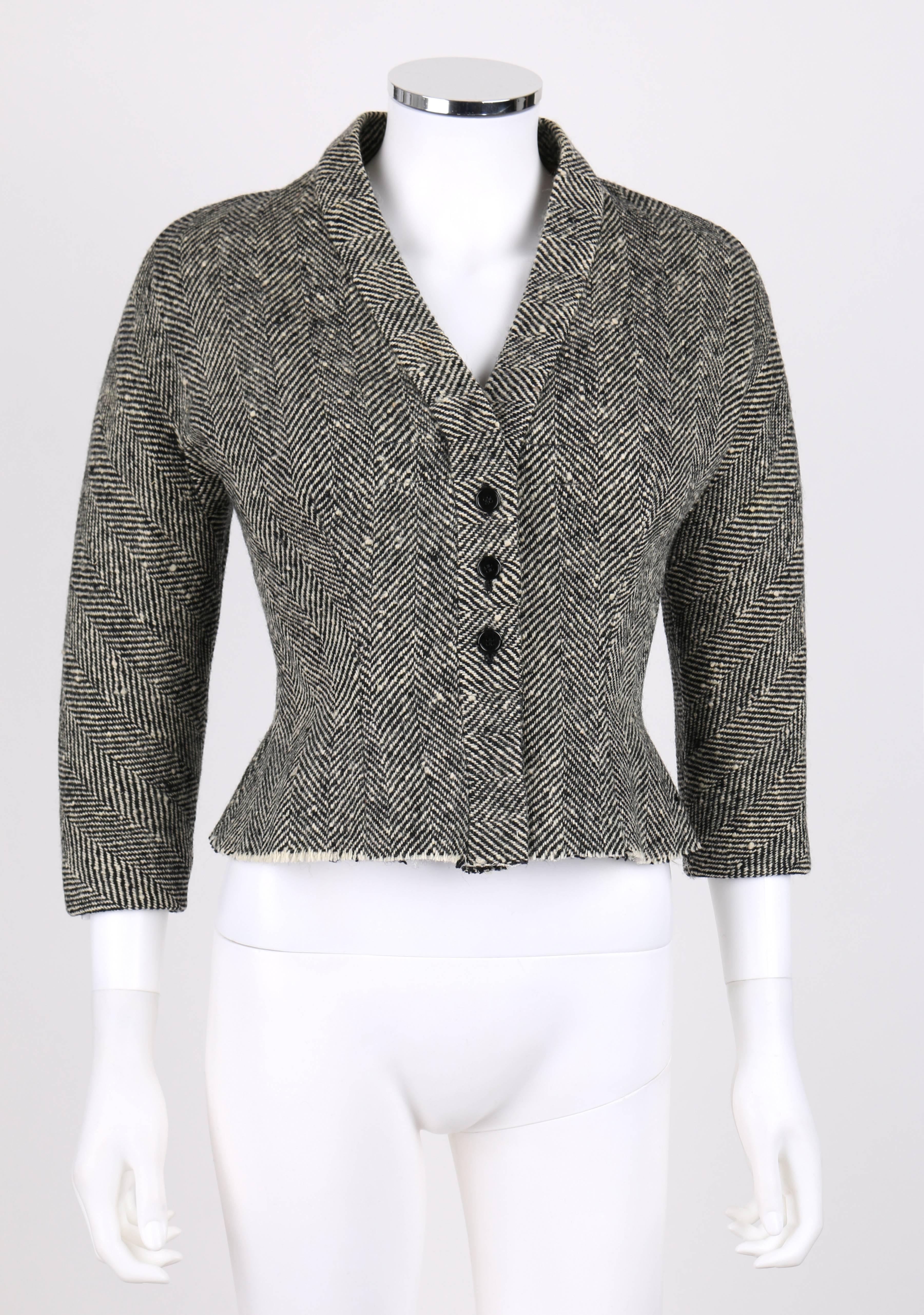 Vintage Hubert de Givenchy c.1952, very early work, black and cream herringbone structured silhouette wool jacket. Hand written couture number 