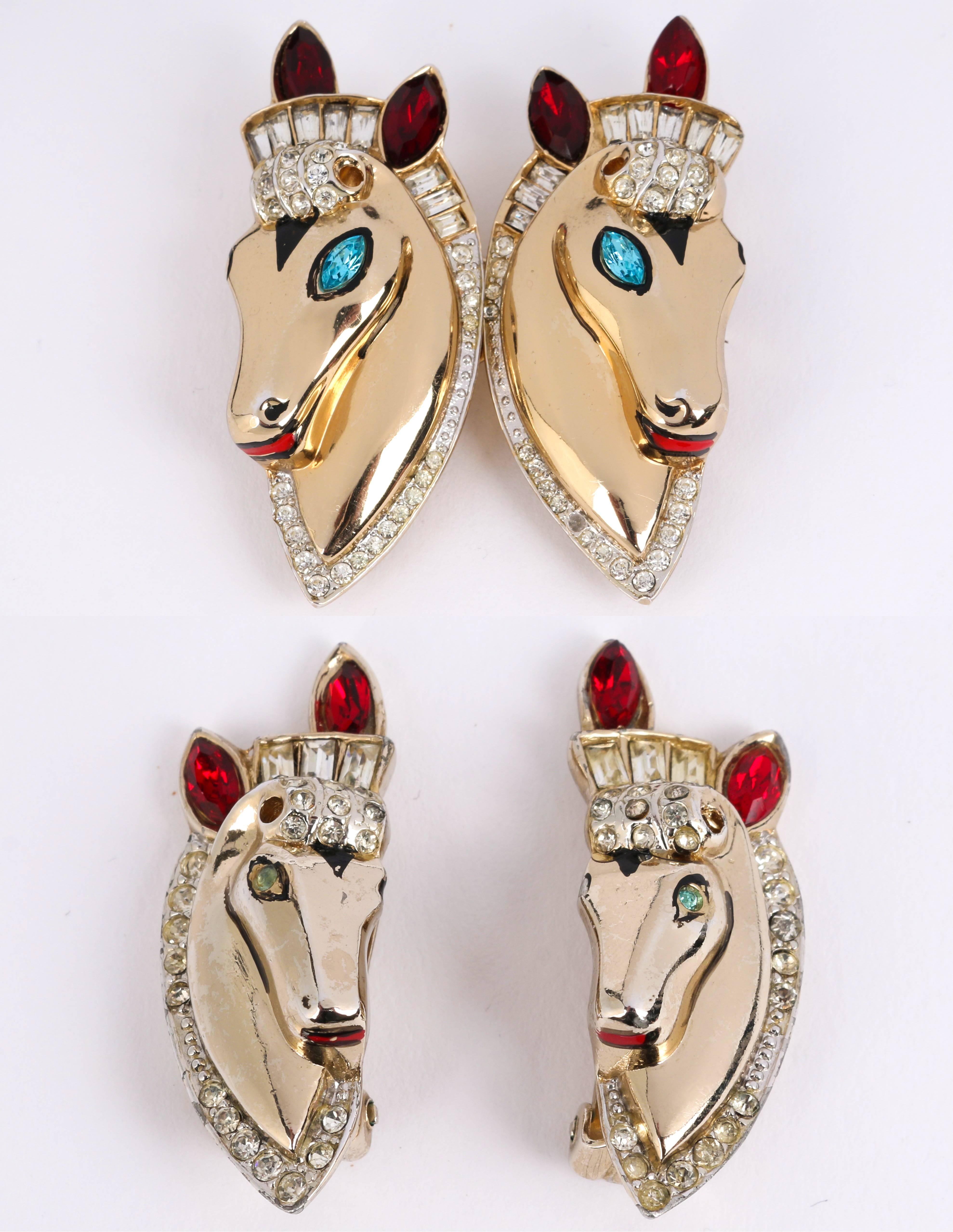 Vintage circa July 13,1943 Coro Craft (designed by A. Katz) gold horse duette brooch/fur clip and clip-on earrings demi parure set. Two horse heads can be worn together as a brooch or separate as fur clips. Brooch and earrings are gold tone with