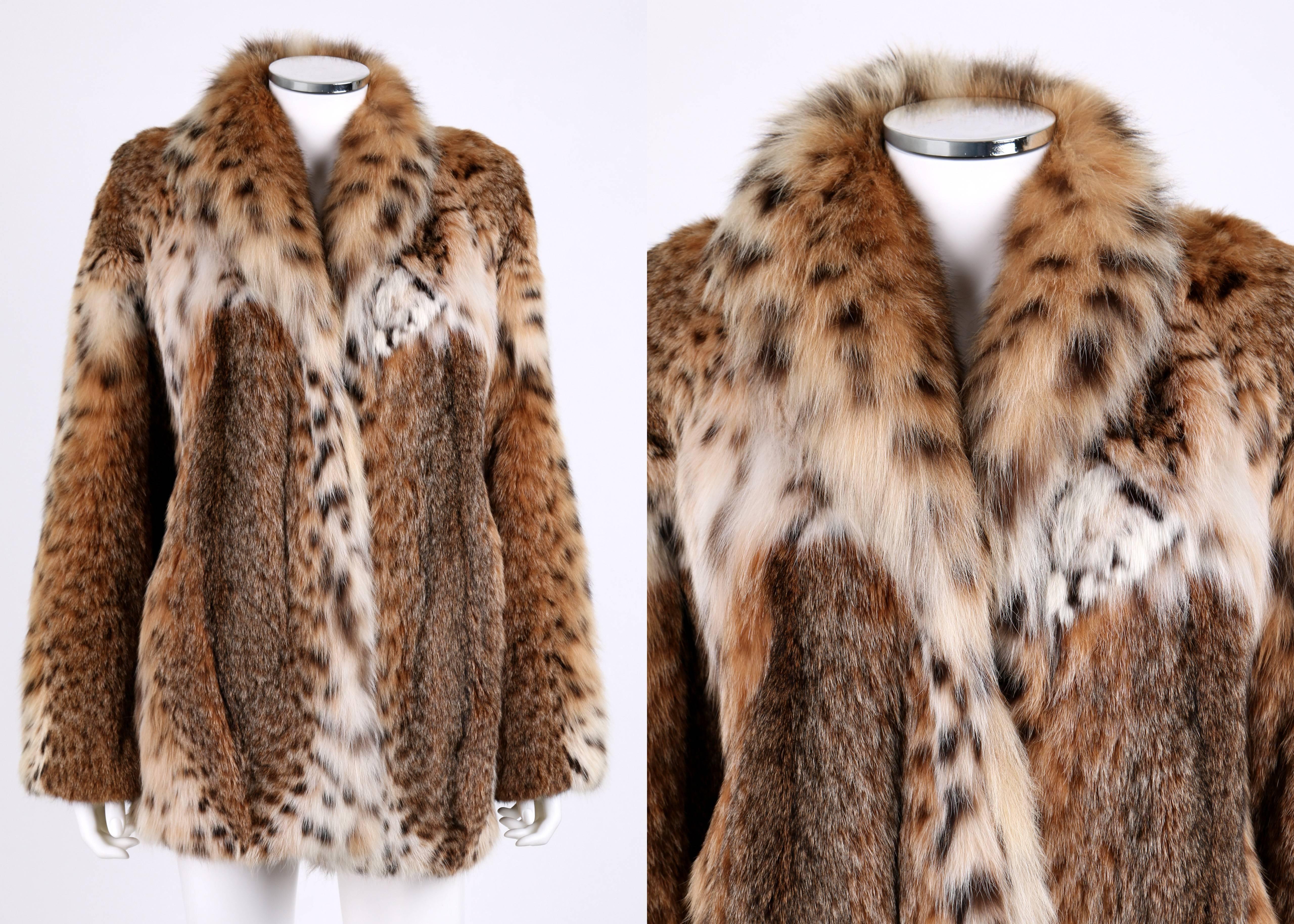 Genuine Bobcat spotted fur stroller coat. Large statement collar. Long sleeve. Two exterior and one interior pocket. Cream satin lining. Hook/eye front closure. Unmarked Fabric Content: Genuine lynx fur; Lining: