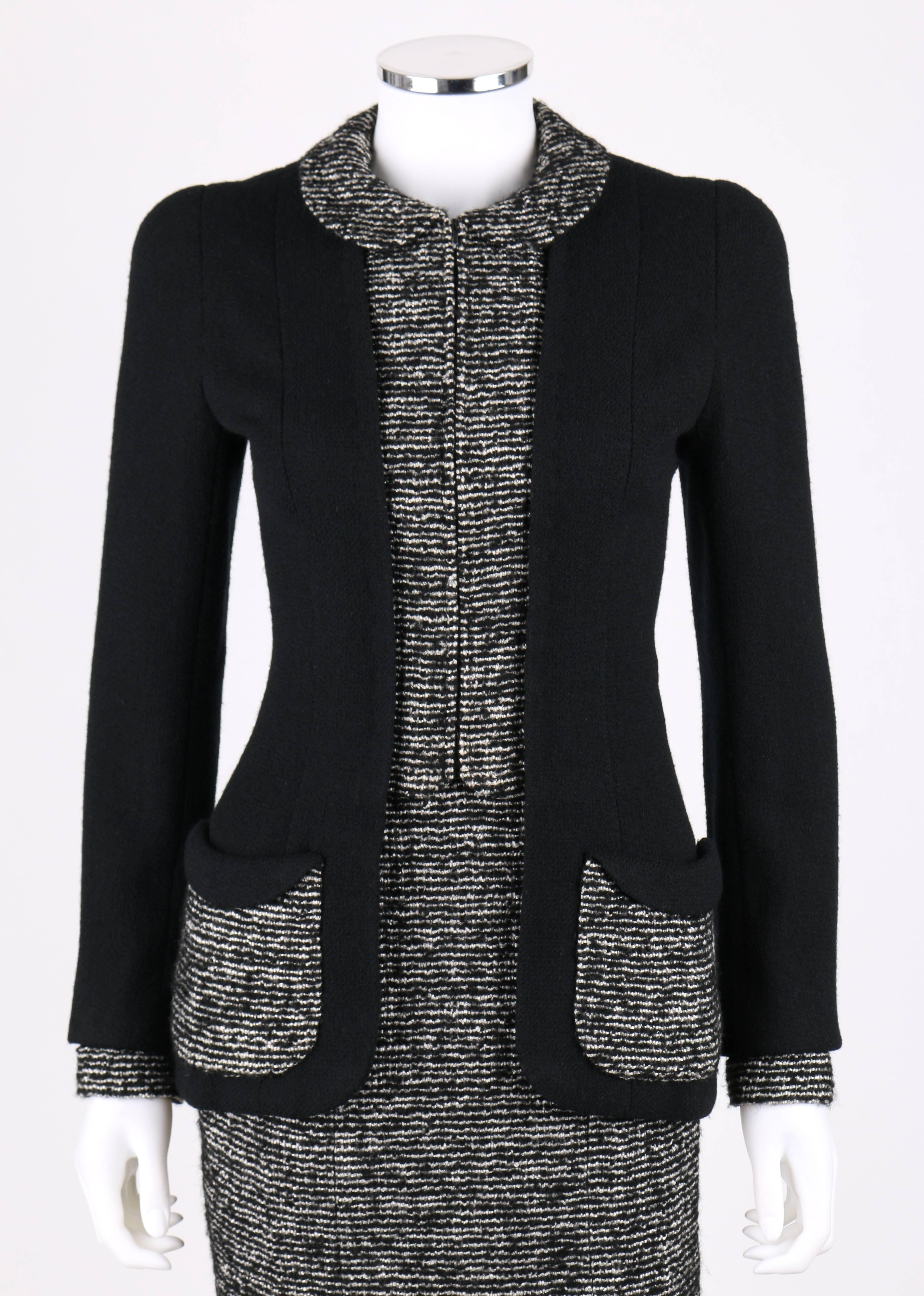 Chanel A/W 1993 Haute Couture numbered (71270 and 71271) black and white wool skirt suit. Designed by Karl Lagerfeld. Classic CHANEL. Black wool jacket is accented in black and white striped boucle wool. Two front rounded patch pockets with flap.