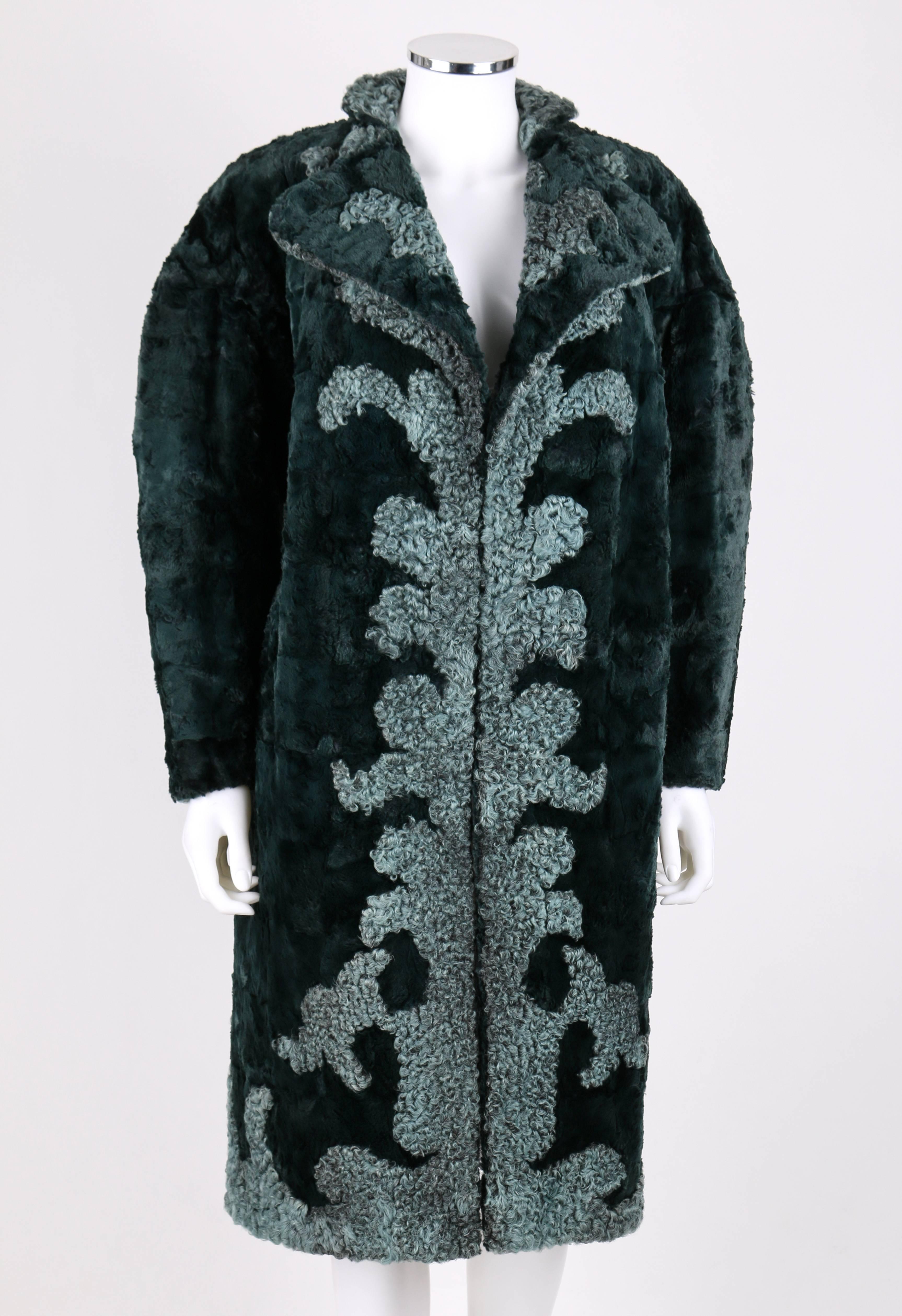 Fendi c.1980's dark green dyed chinchilla and light gray-green astrakhan / persian lamb fur coat. Genuine chinchilla fur with astrakhan / persian lamb fur filigree design. Long leg o' mutton style sleeves. Notched lapel collar. Two front inseam
