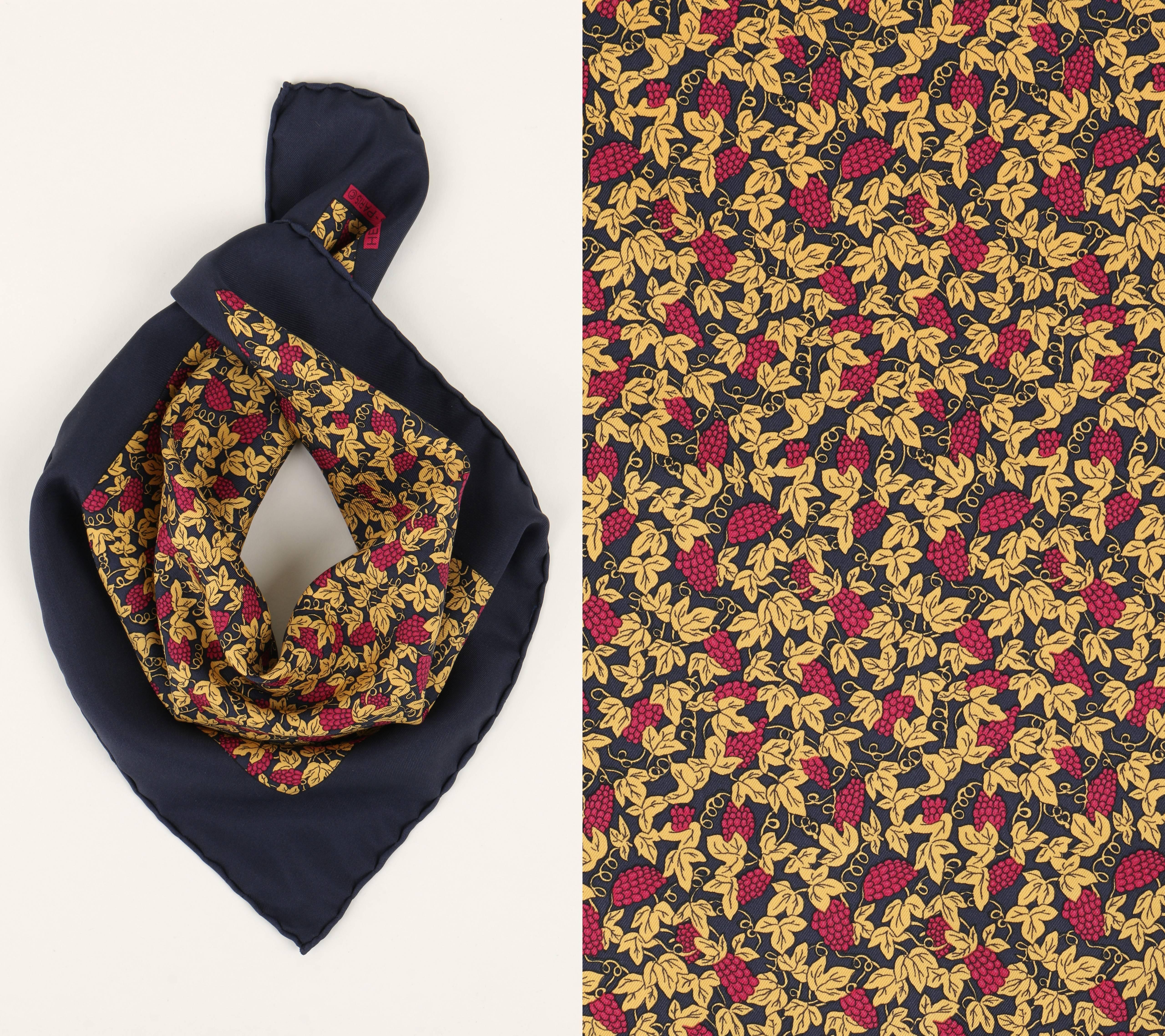 Vintage Hermes exclusively sold at Neiman Marcus navy blue silk pocket square scarf. Grapevine motif print. Hand rolled edges.  "Hermes-Paris" printed signature.  Marked Fabric Content: "100% Silk". 

Measurements:
Length: