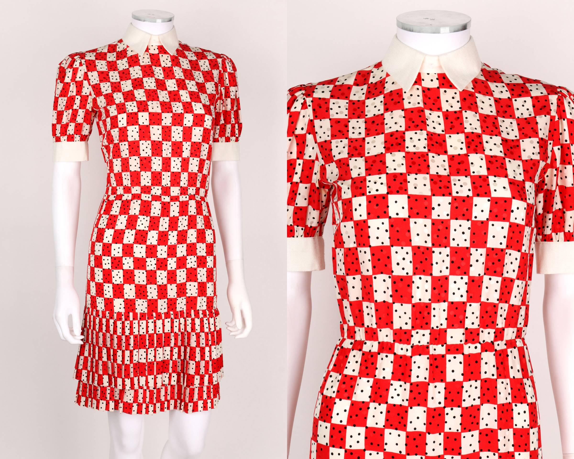 Vintage Bill Blass c.1980's silk shirtwaist dress. Red and white checkerboard pattern silk with black abstract polka dot overlay. Short puff sleeves with white single button closure cuffs. Shirt collar. Seven center back button closures. Mismatched