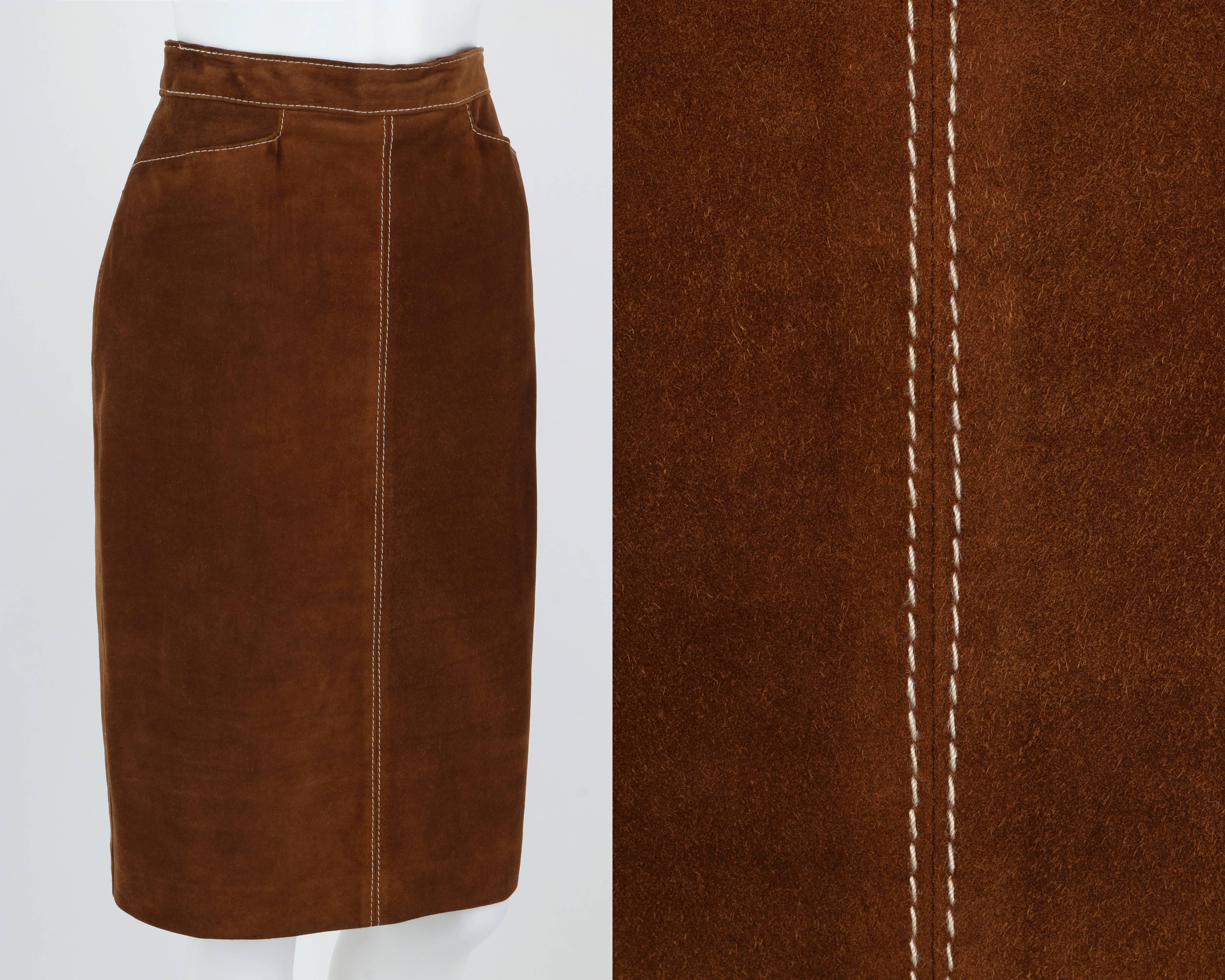 Vintage Hermes c.1970's brown calfskin suede leather pencil skirt. Four panels. Two inset pockets in front. Hidden zipper and signature 