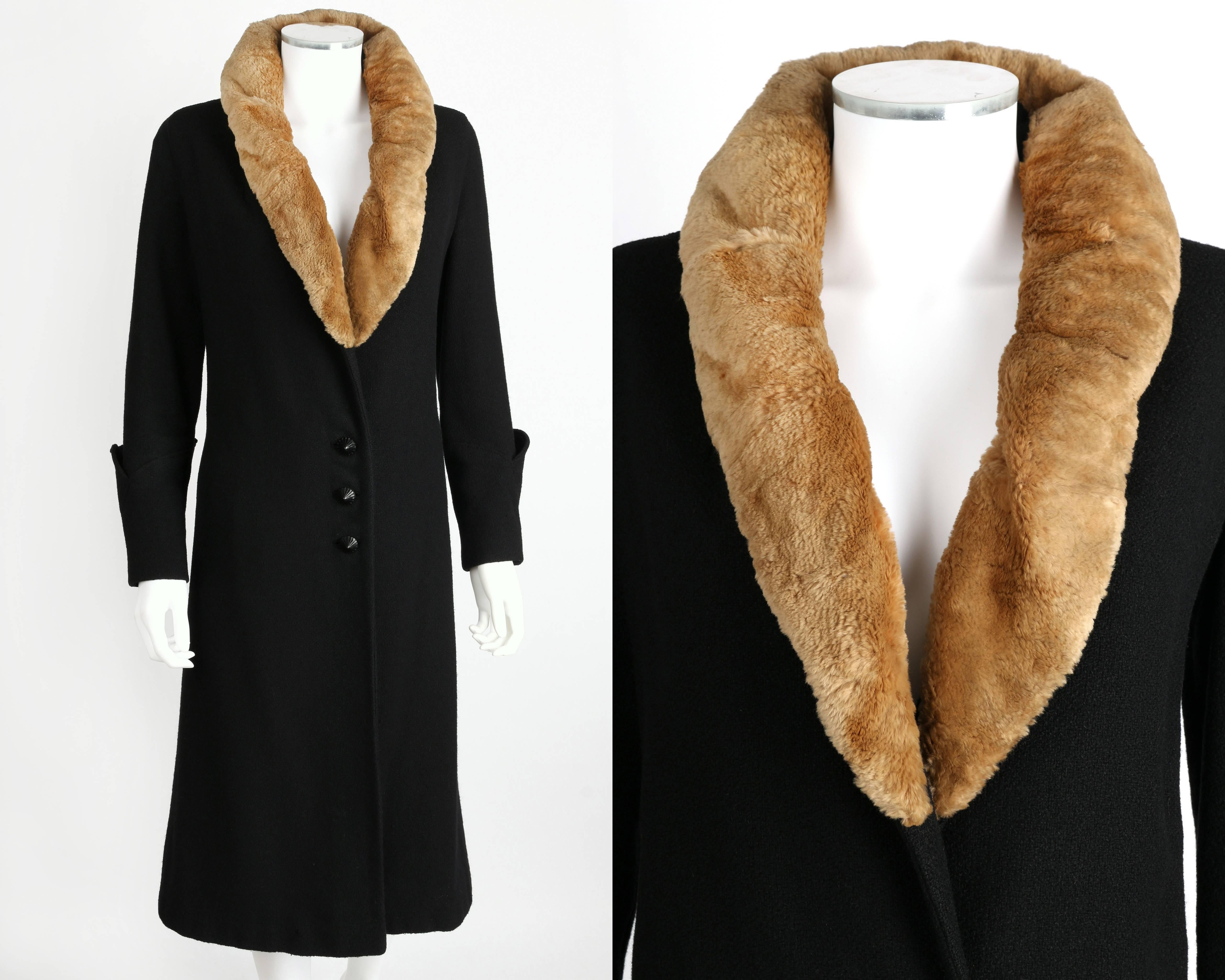 Vintage c.1910's Edwardian coat Fashioned by Miller.  Black wool. Quilted embroidered sculptural art deco detail cuffs with two button detail. Three center front button closures. Black cone shaped buttons. Tan genuine sheared beaver fur shawl