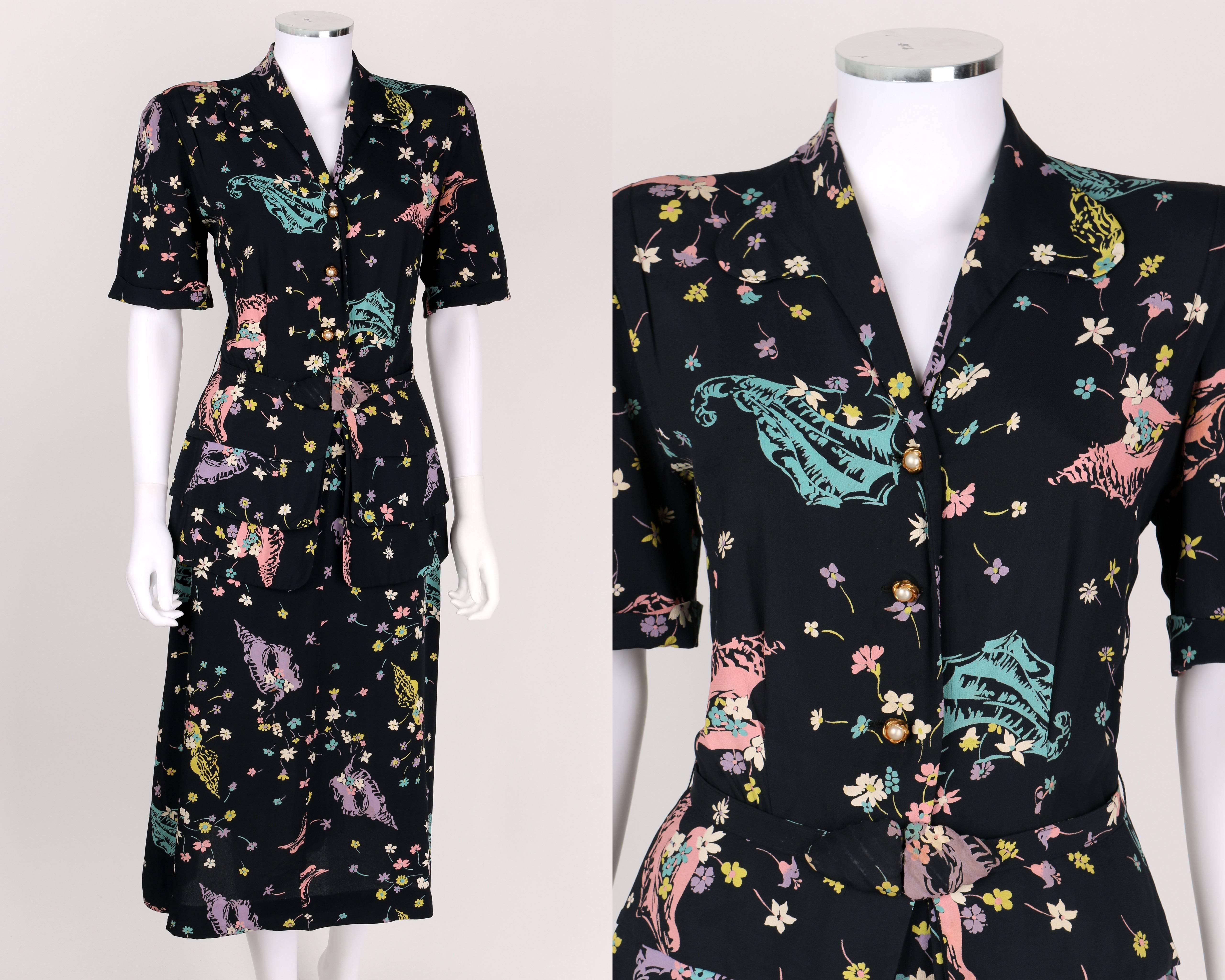 Vintage Georgiana c.1940's Navy blue peplum day dress. Multicolor pastel floral and seashell print on navy blue rayon crepe. Short sleeves with turned up cuff. Rounded lapel collar. Three center front button closures. Gold toned and pearl floral
