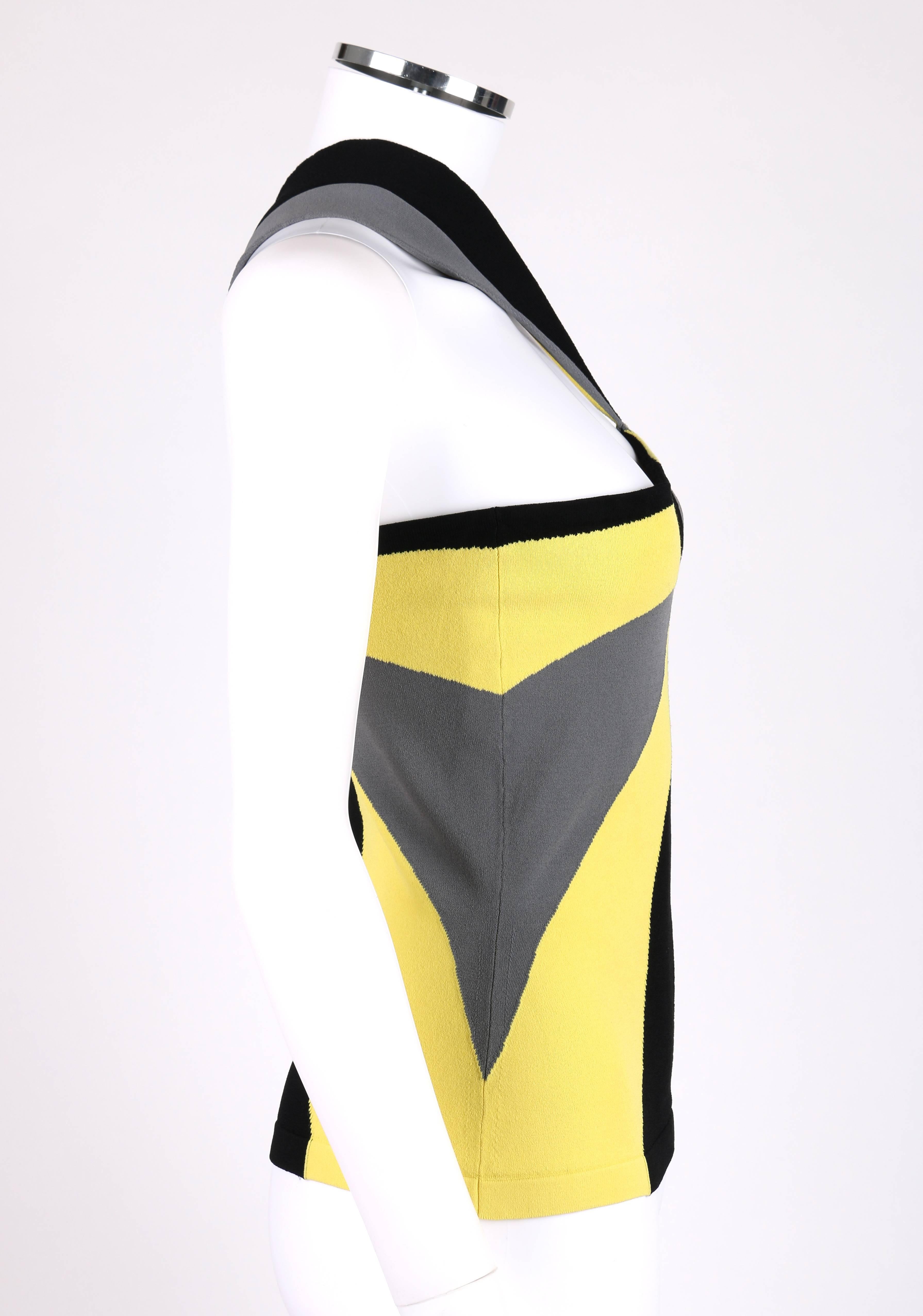 Alexander McQueen Resort 2010 knit tank top. Runway look #19. Yellow, black, and gray starbust op art pattern. Sleeveless. Two stylistic halter style straps. Marked Fabric Content: 