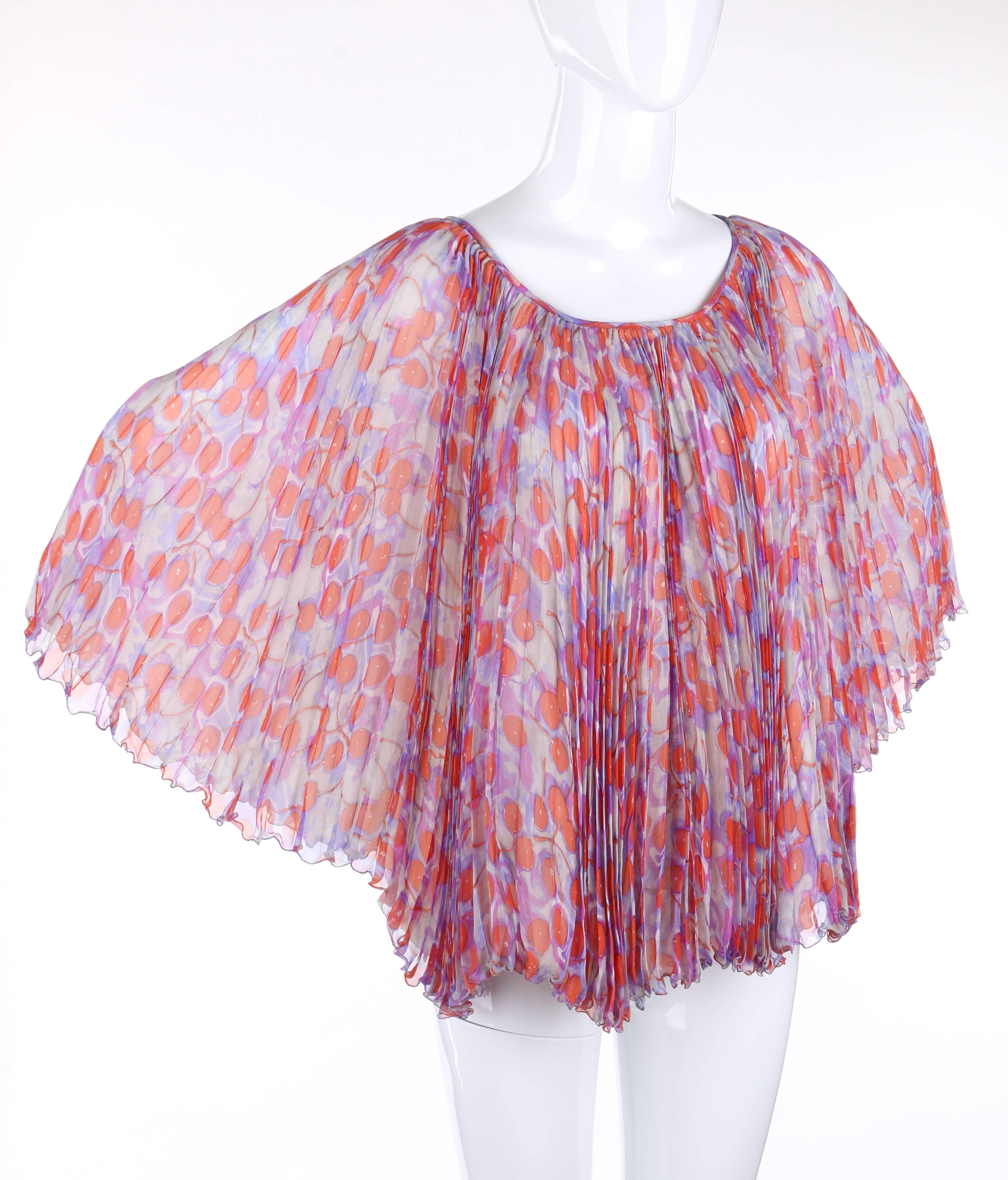 Alexander McQueen S/S 2003 silk chiffon cherry print accordion pleated top. From Alexander McQueen's "Irere" collection. Multi-color cherry print in shades of white, red, blue, and purple. Scoop neckline. Center back single button and loop
