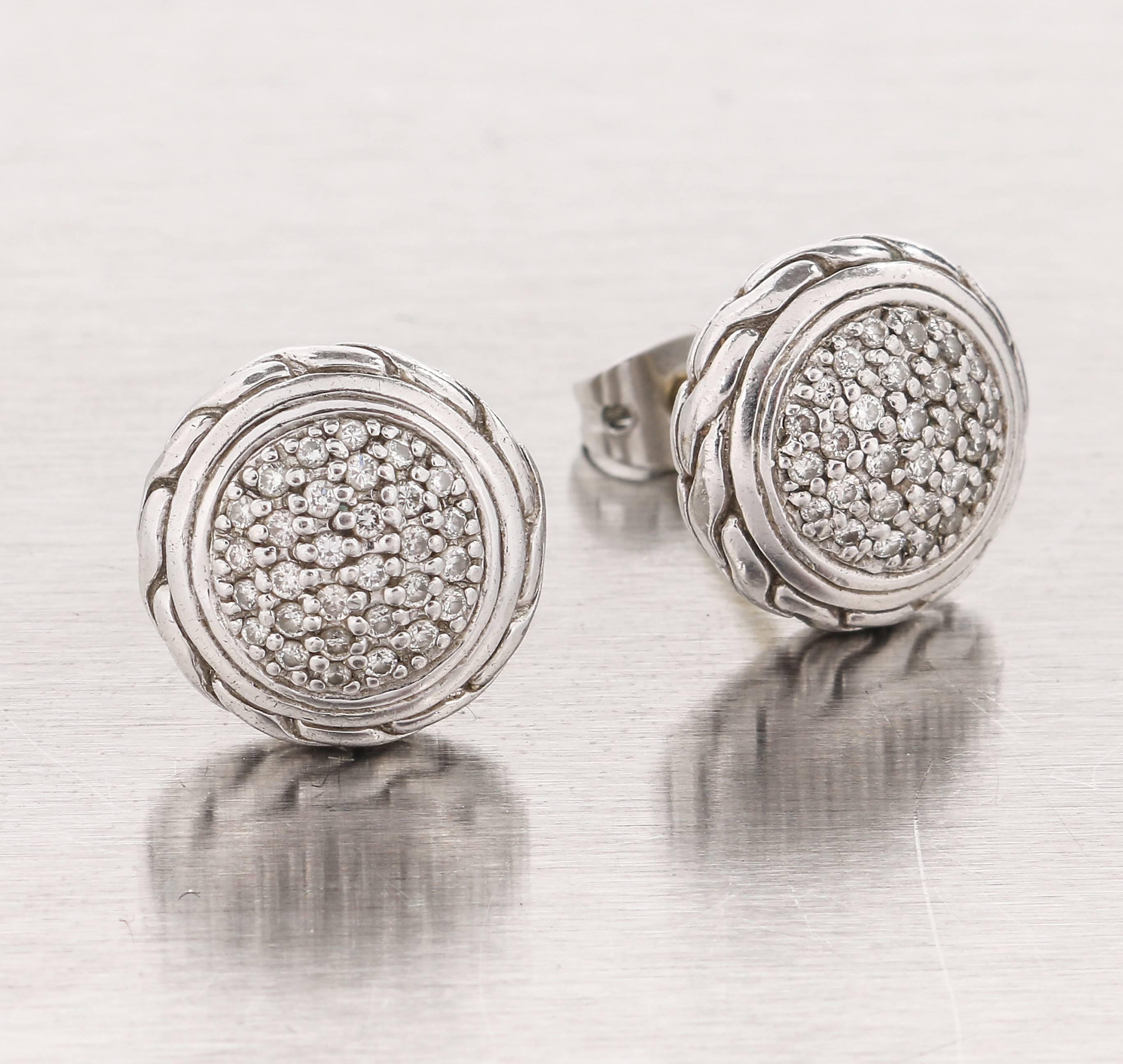 John Hardy from the “Classic Chain” collection round pave diamond sterling silver and 18k gold stud earrings. Round sterling silver faceted paved diamond stud earrings (approximately measuring 12mm W X 12mm L X 16mm H, including 18K gold backing