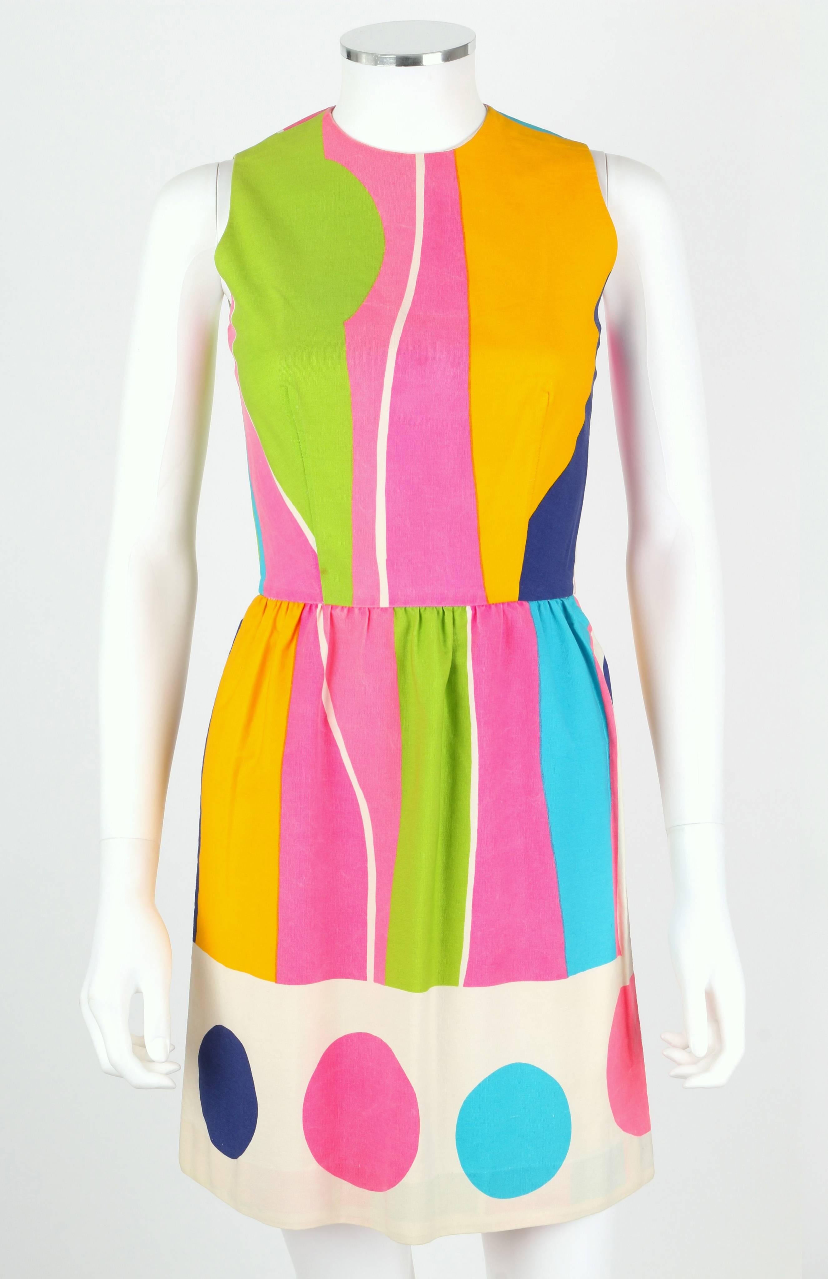 Vintage Lanz Originals c.1960's cotton canvas sleeveless shift dress. Bright multi-color abstract color-block print in shades of hot pink, yellow, lime green, teal, and navy blue with circle print boarder at hemline. Crew neckline. Gathered