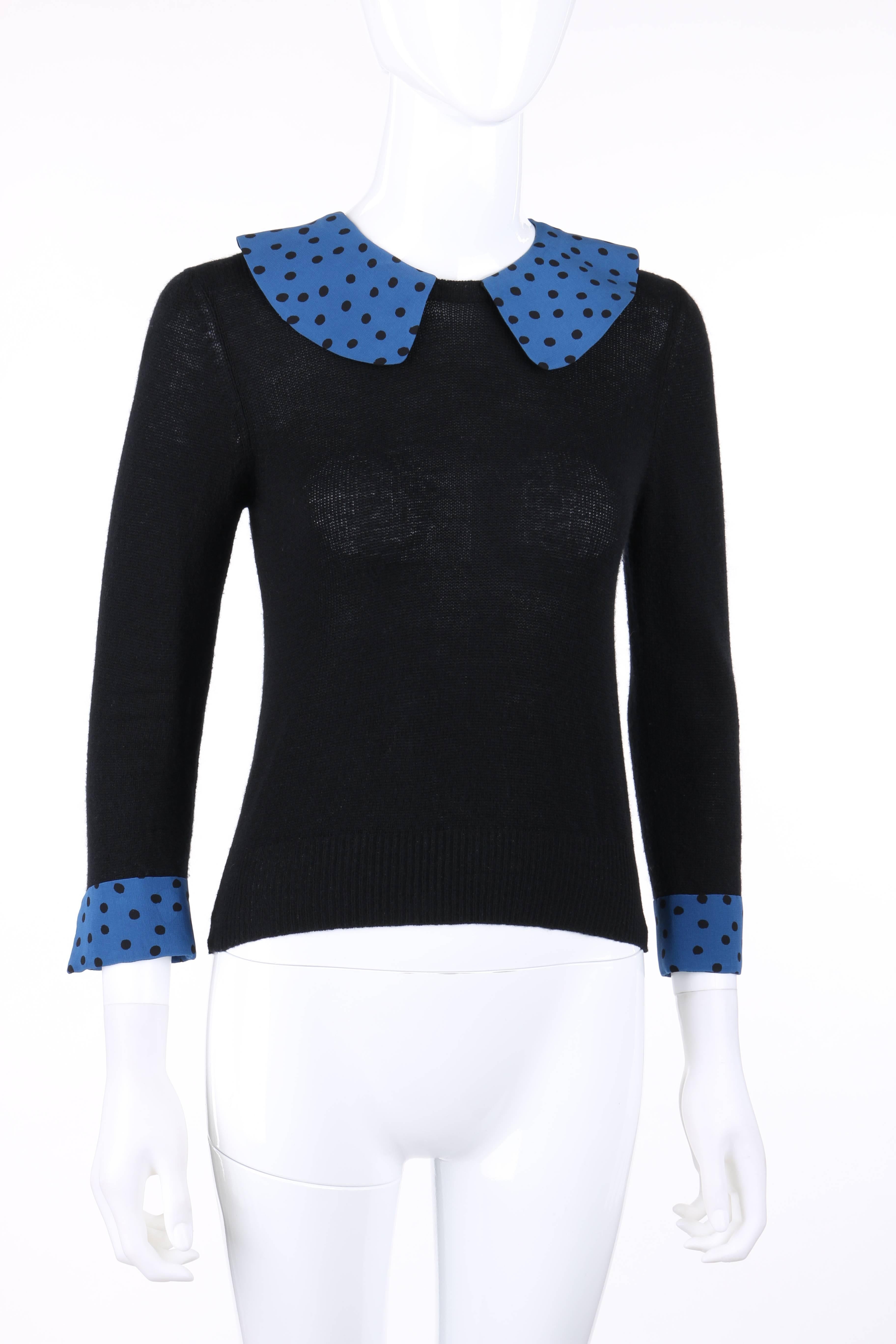 Louis Vuitton S/S 2005 black & blue polkadot wool cashmere sweater. Designed by Marc Jacobs. 3/4 length sleeves. Silk blue & black polkadot peter pan collar and cuffs. Thirteen center back blue & black polka dot dome button closures. Rib knit
