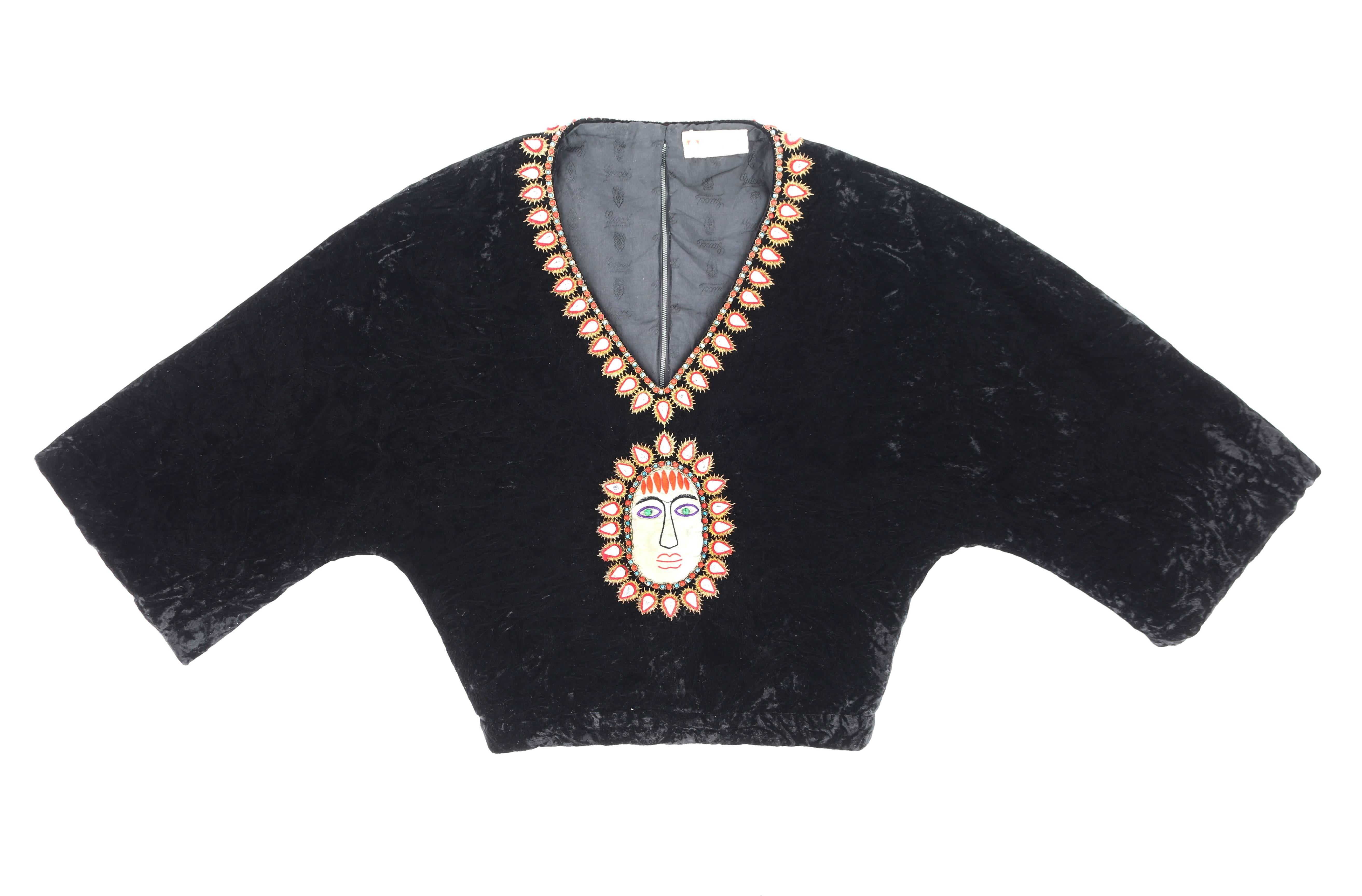 Extremely rare vintage Gucci c.1970's black crushed velvet cropped blouse. Bohemian beaded and embroidered detail at neckline and center front made up of blue and red rounded glass beads, faceted tear drop crystals with red and gold surrounding