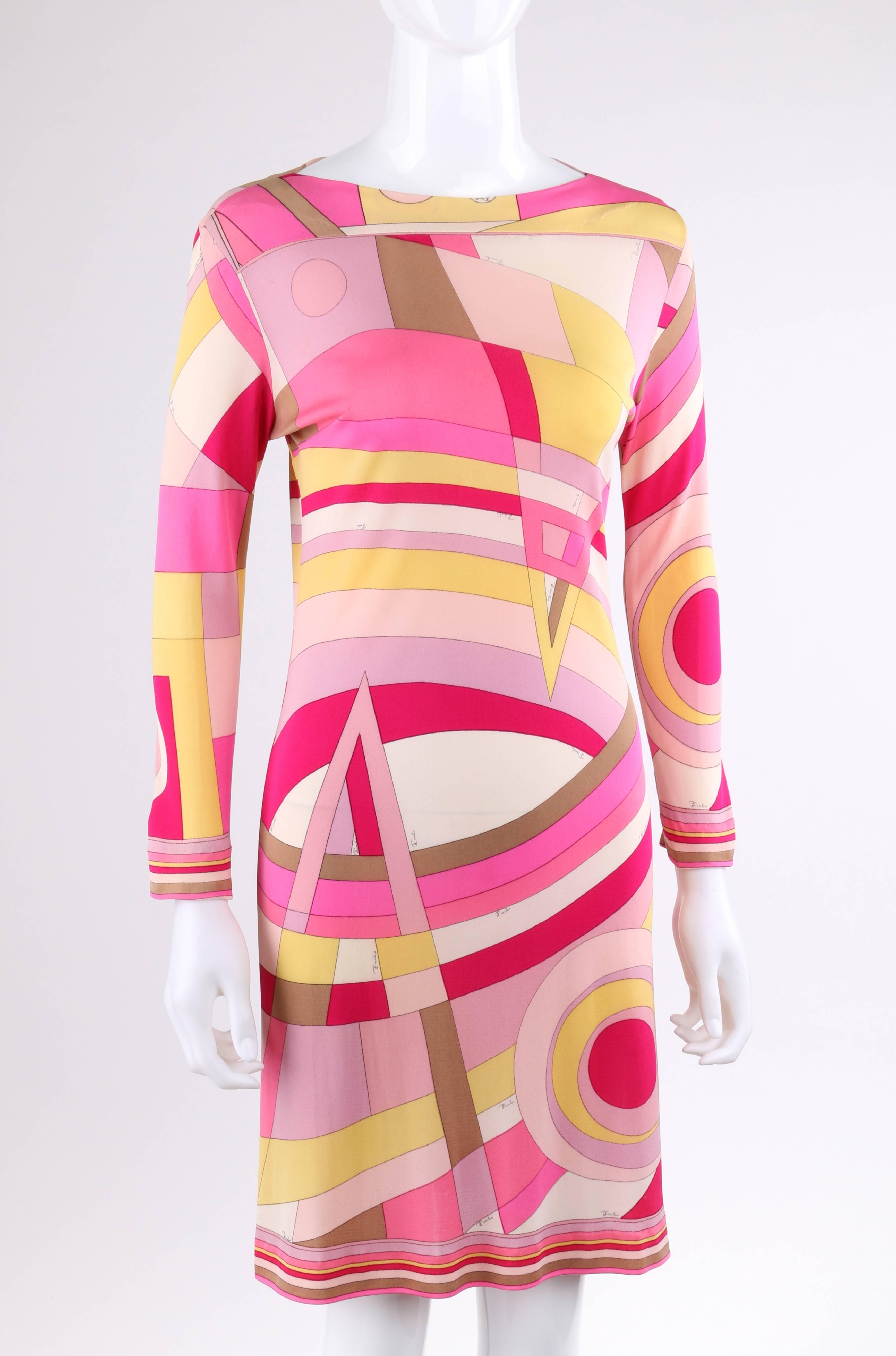 Vintage Emilio Pucci c.1968 silk jersey shift dress. Multicolor geometric op art signature print in shades of pink, yellow, fuchsia, and brown. Striped boarder print at cuffs and hemline. Bateau neckline. Long sleeves. Slip-on shift style. Marked