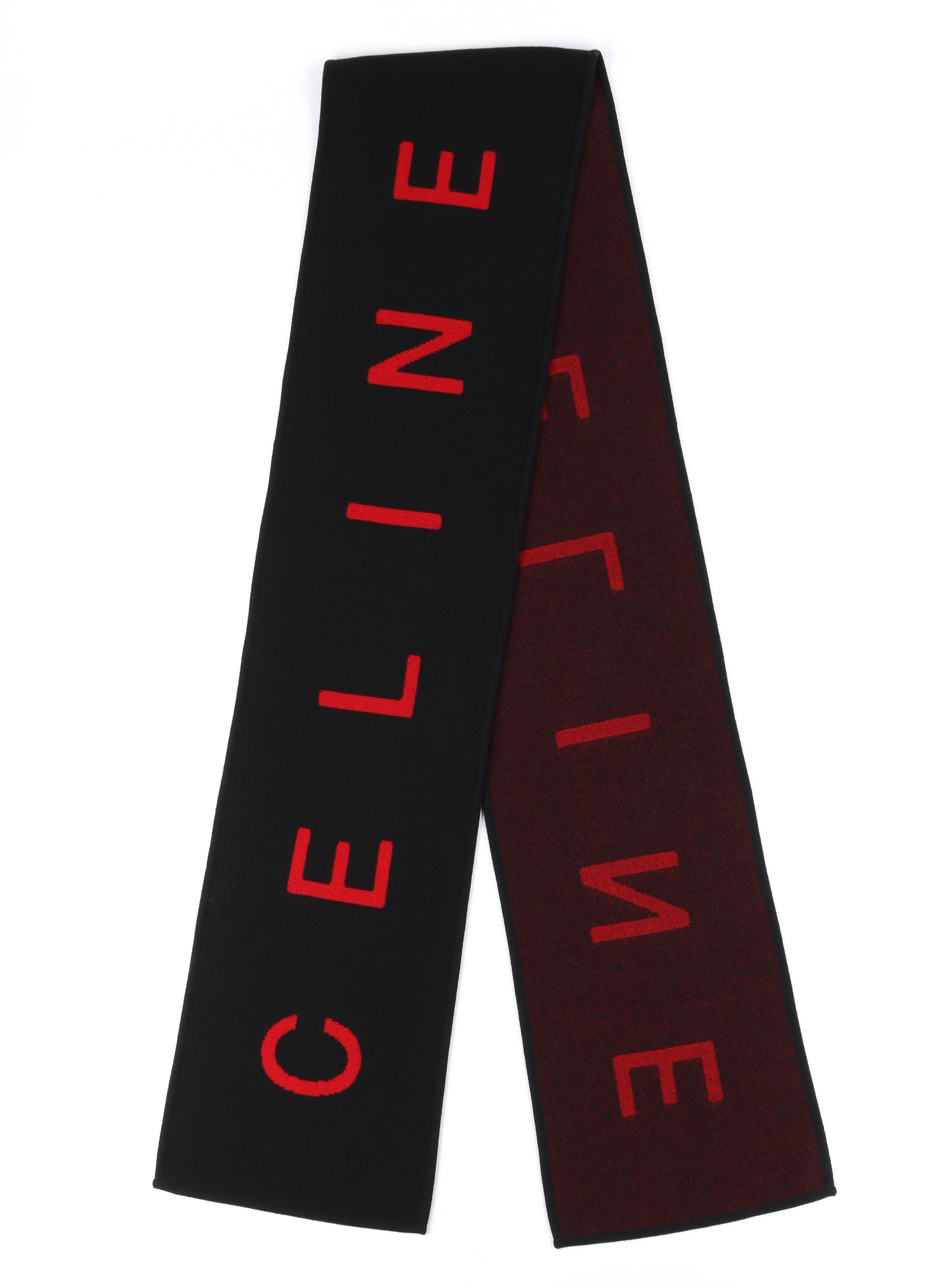 Celine black & red wool blend double knit scarf. Long oblong shape. Black background with red "Celine" pattern. Rib knit boarder. Unmarked Fabric Content: Wool blend. Measurements:

Length: 110"
Width: 13"