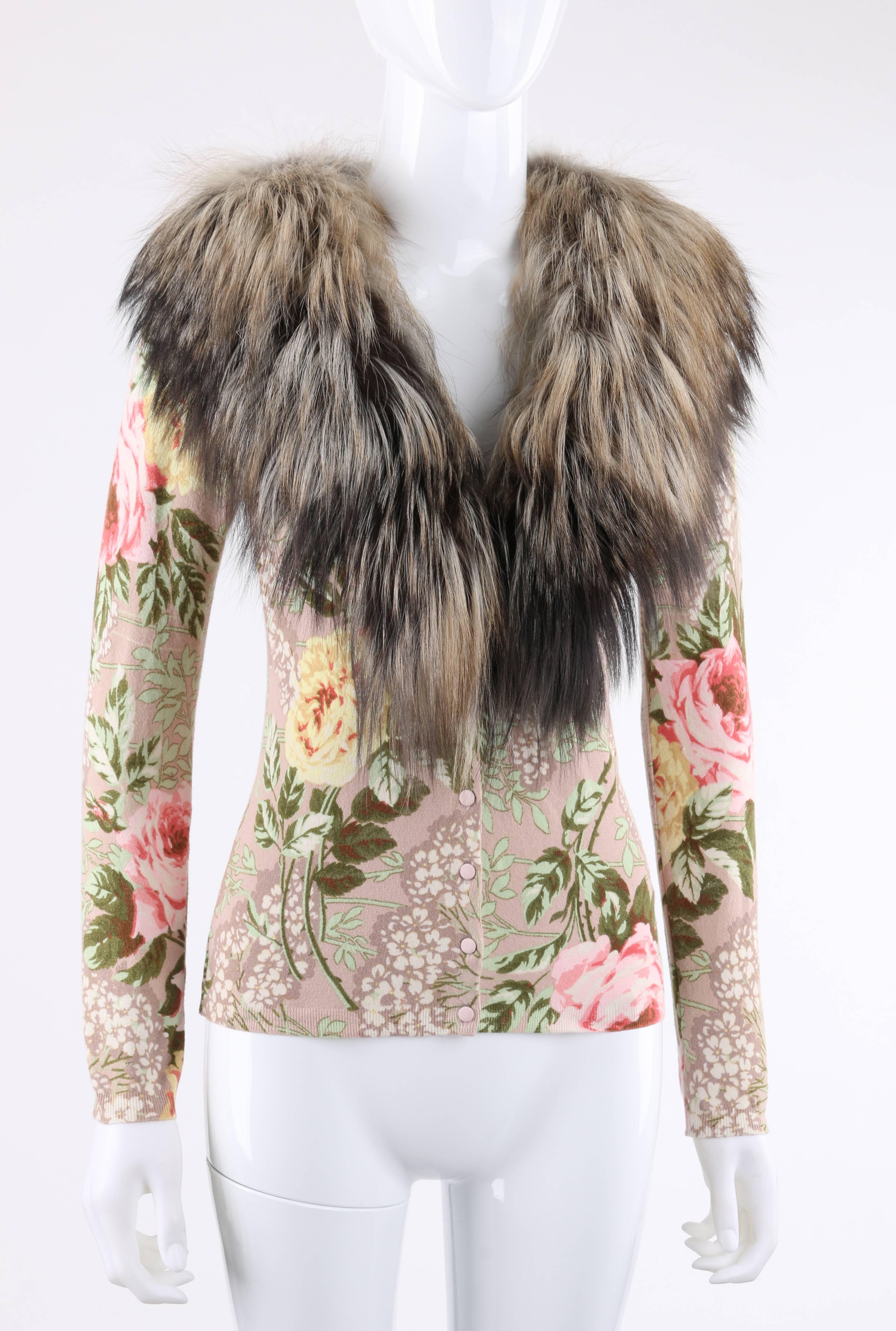 Blumarine Autumn/Winter 2006 mauve floral rose print cardigan with genuine fox fur shawl collar. Long sleeves. Six center front covered button closures. V-neckline. Rib knit detail at cuffs and hemline. Unmarked Fabric Content: cashmere blend.